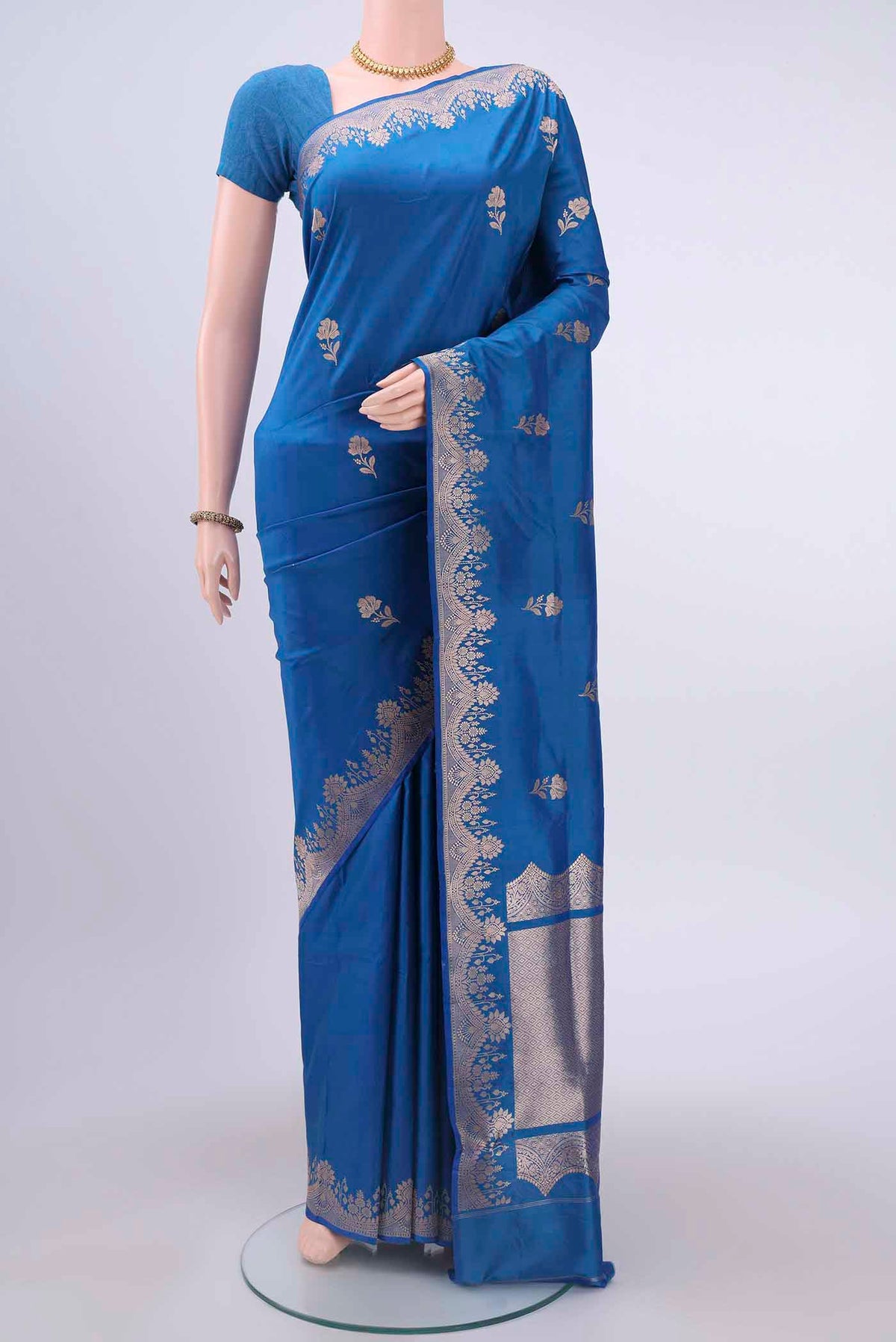 Blue Dual Tone Banarasi Katan Silk Saree with Zari Butta on the body and Zari Border displayed on a mannequin
