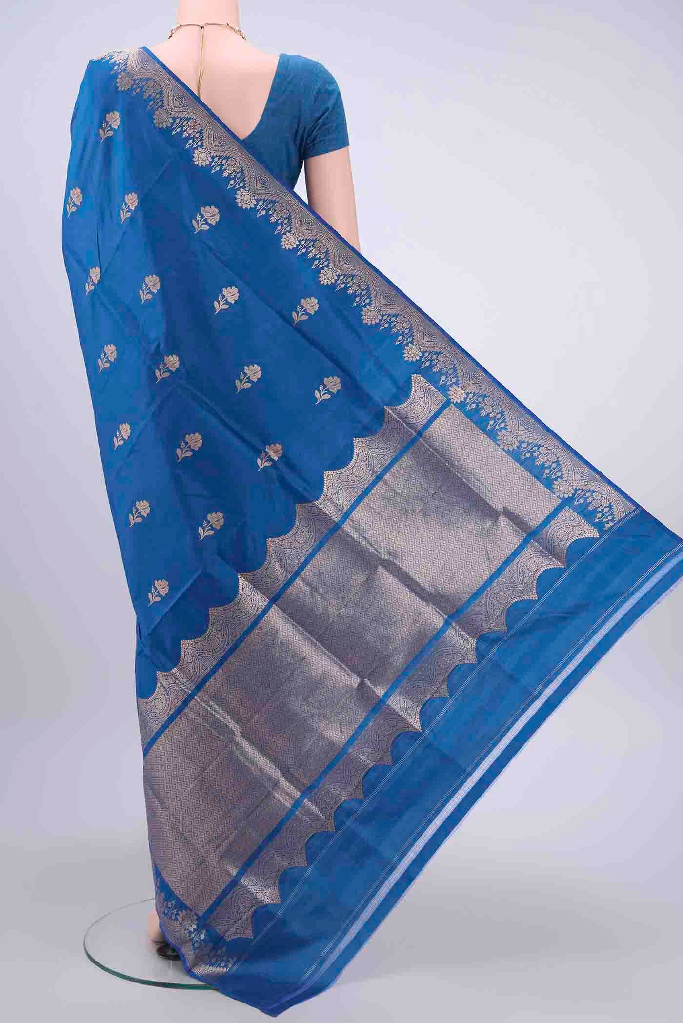 Flat view of Blue Dual Tone Banarasi Katan Silk Saree with Zari Butta on the body and Zari Border