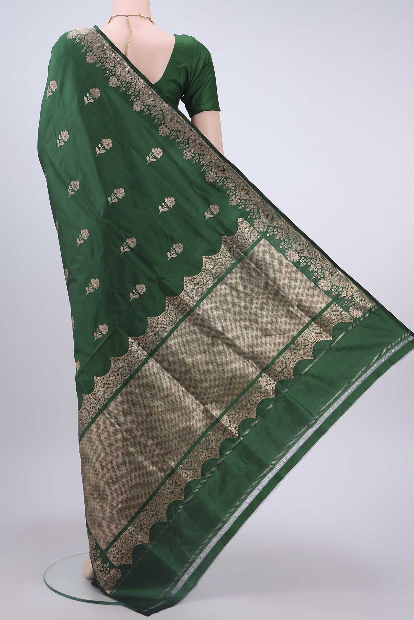 Flat view of Bottle Green Dual Tone Banarasi Katan Silk Saree with Zari Butta on the body and Zari Border