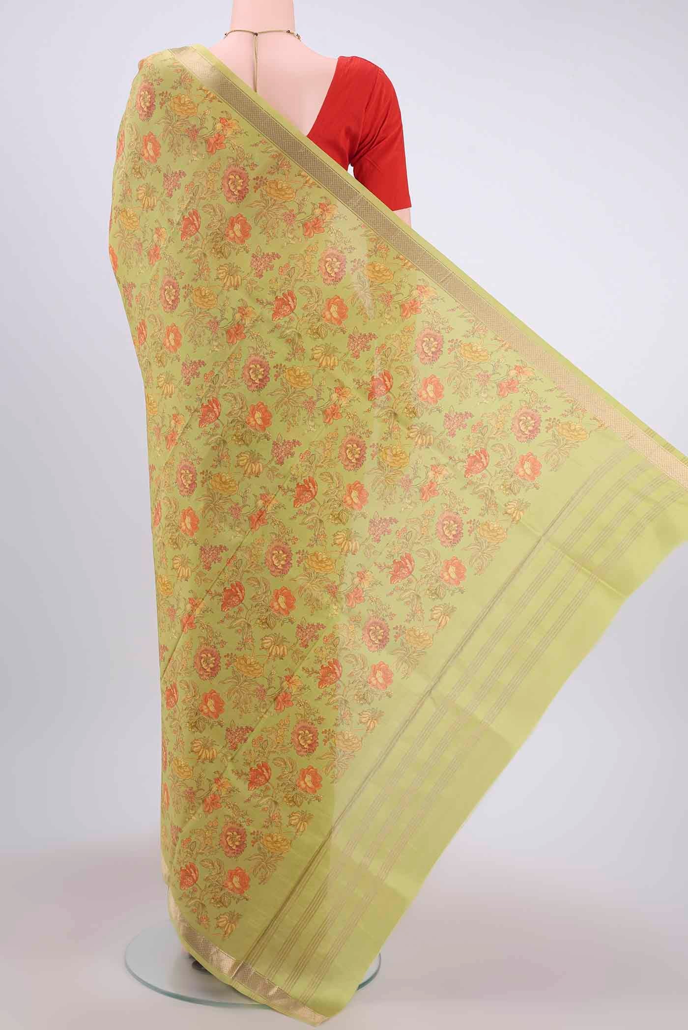 Flat view of Parrot Green Printed Silk Saree with Floral Print on the body and Zari Border