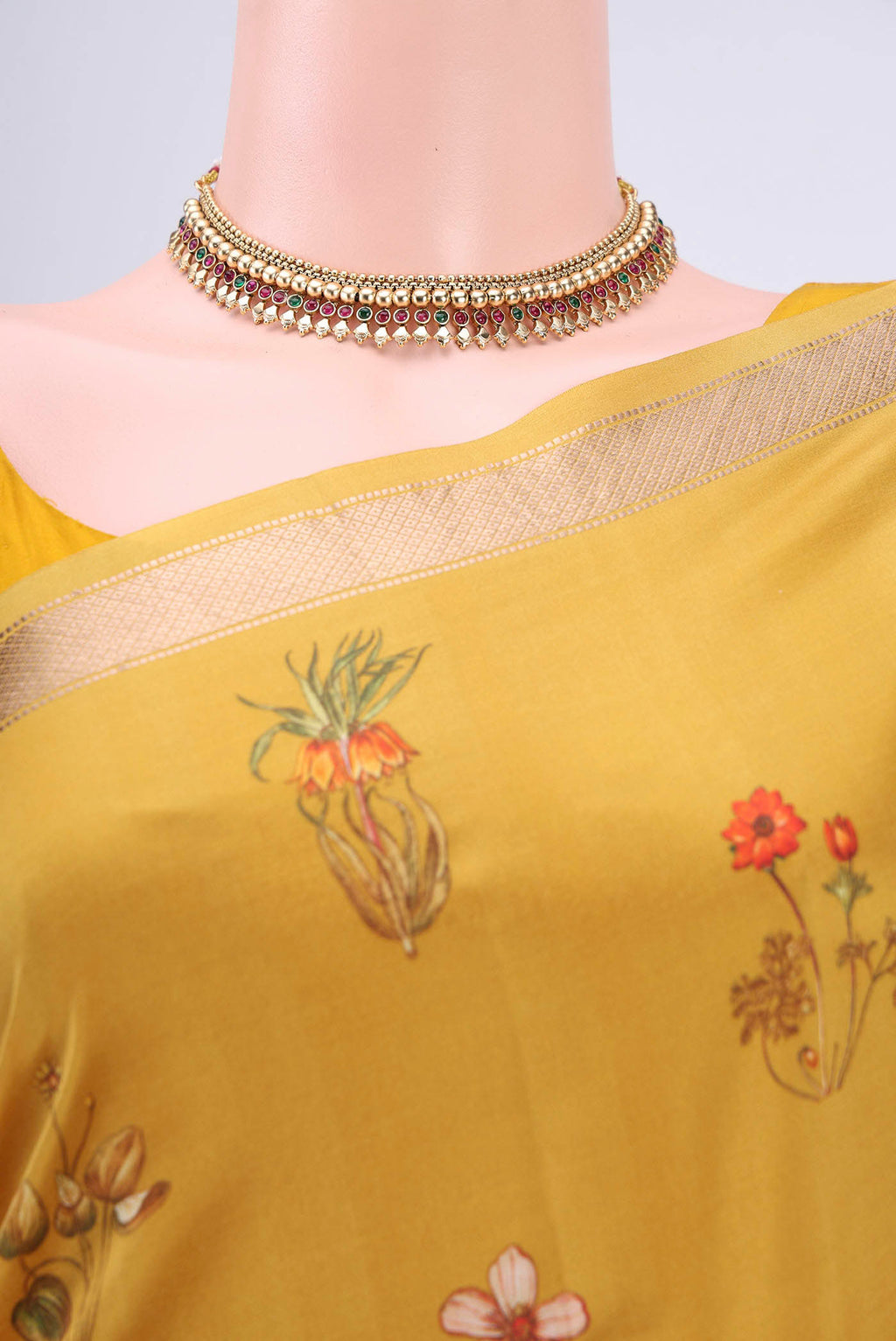 Border image of Mustard Mysore Crepe Saree with Floral Print on the body and Zari Border. 
