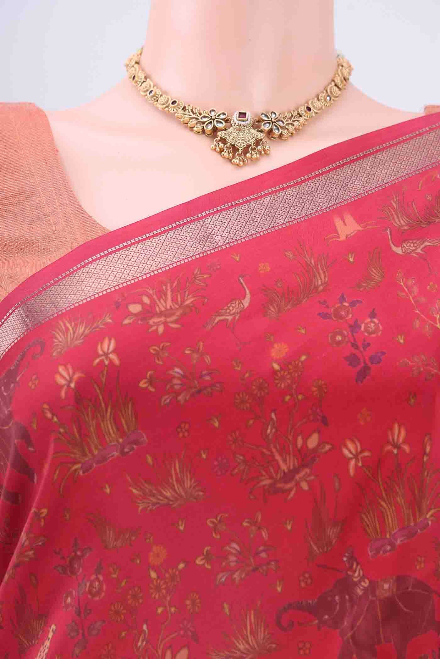 Border image of Maroon Printed Silk Saree with Floral Print on the body and Zari Border