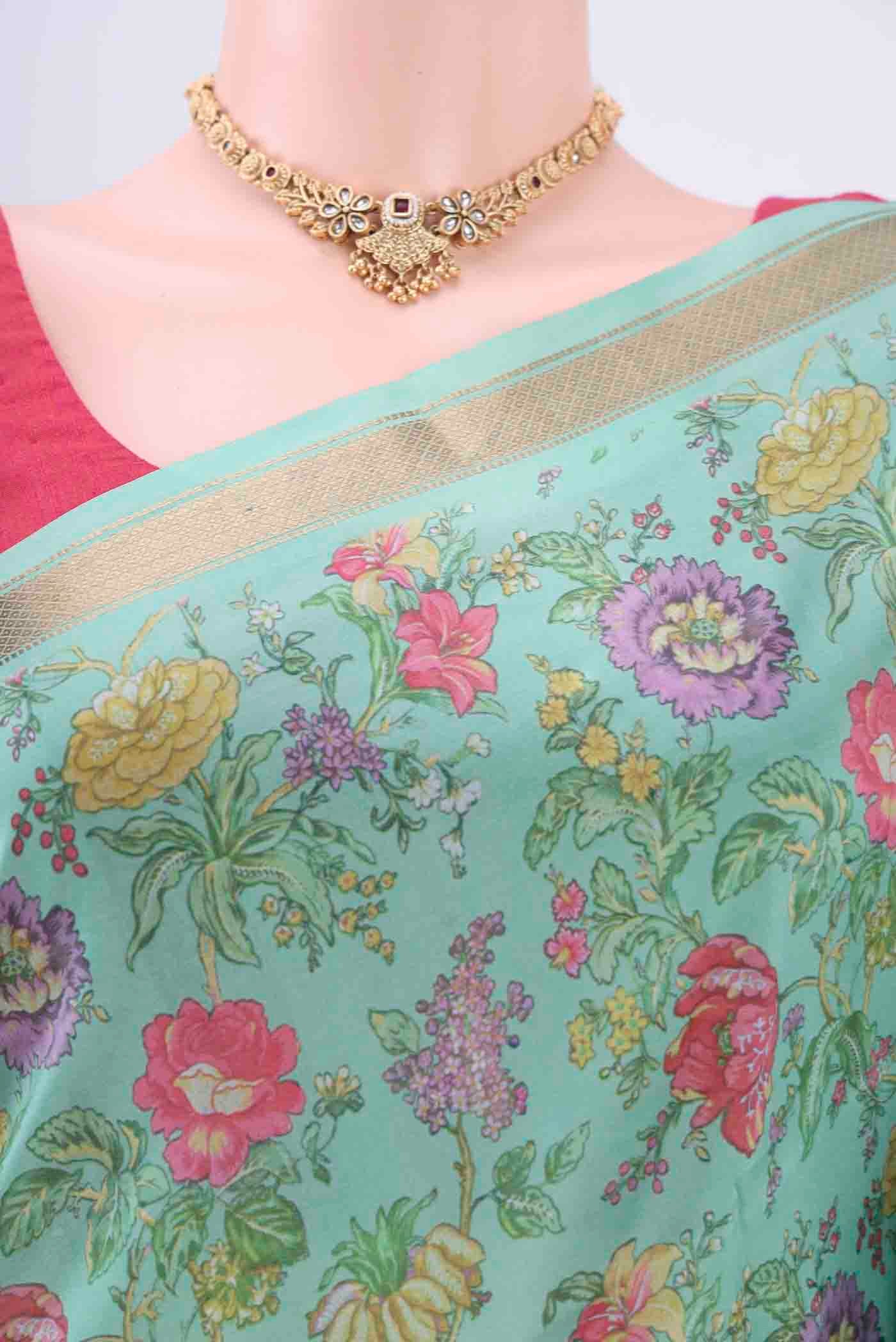 Border image of Mint Green Printed Silk Saree with Floral Print on the body and Zari Border
