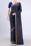 Navy Blue Printed Silk Saree with Printed design on the body and Printed Border.  displayed on a mannequin