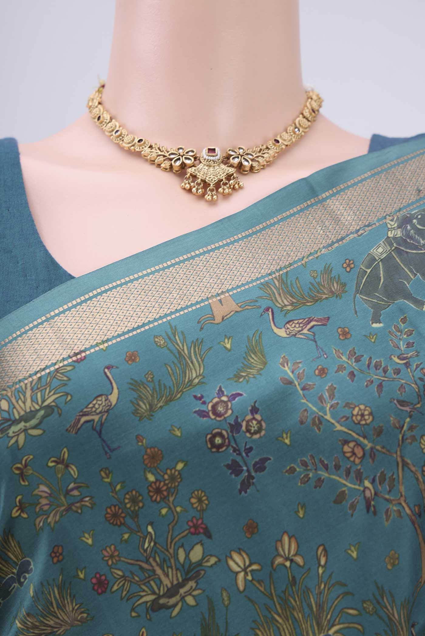 Border image of Sea Green Printed Silk Saree with Printed design on the body and Zari Border. 
