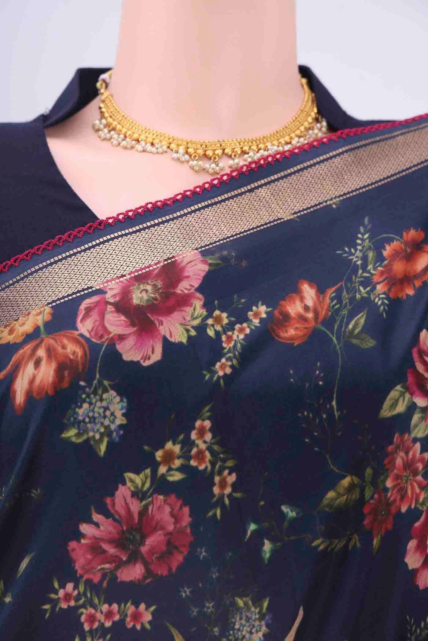 Border image of Navy Blue Printed Silk Saree with Floral Print on the body and Zari Border