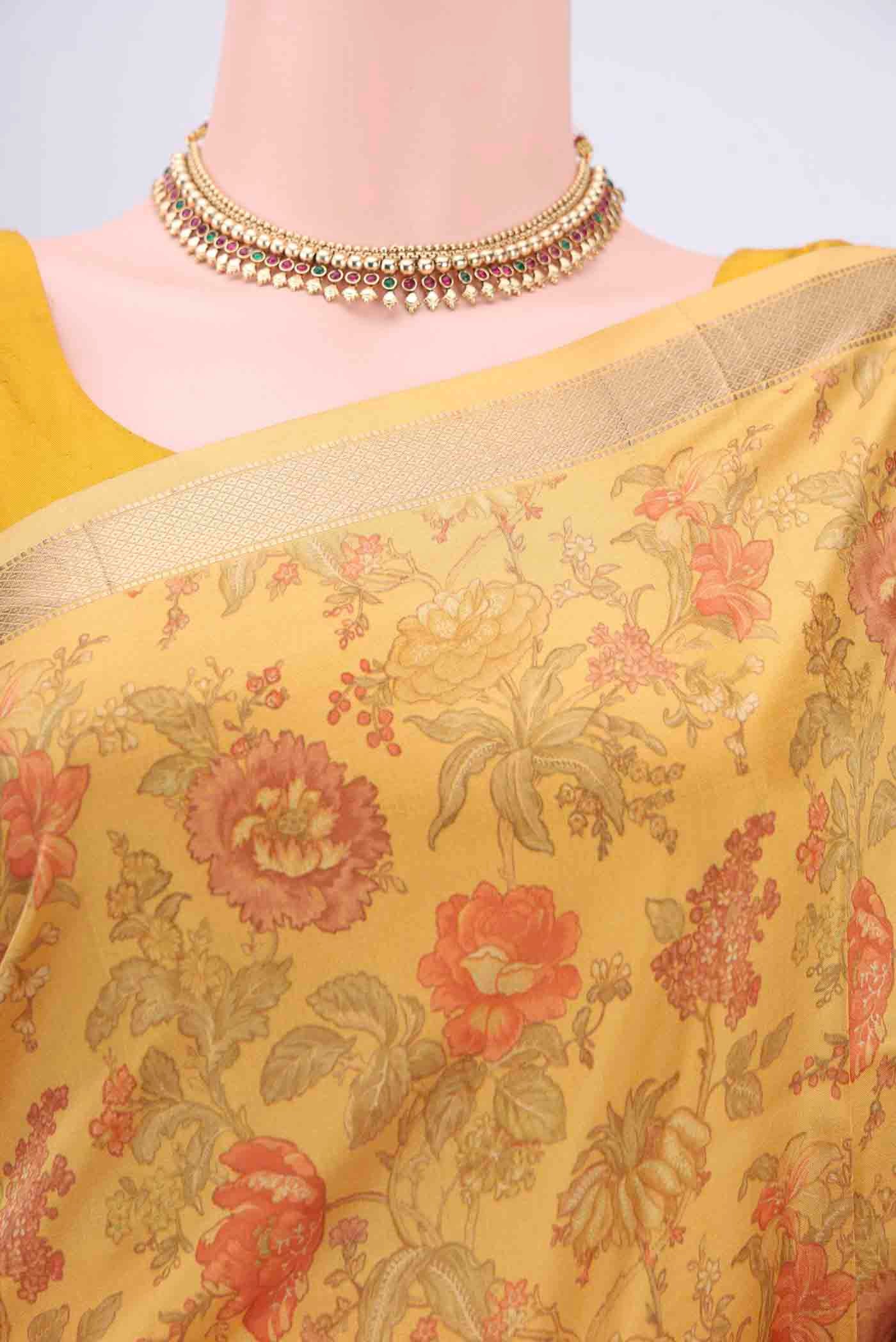 Border image of Mustard Printed Silk Saree with Floral Print on the body and Zari Border