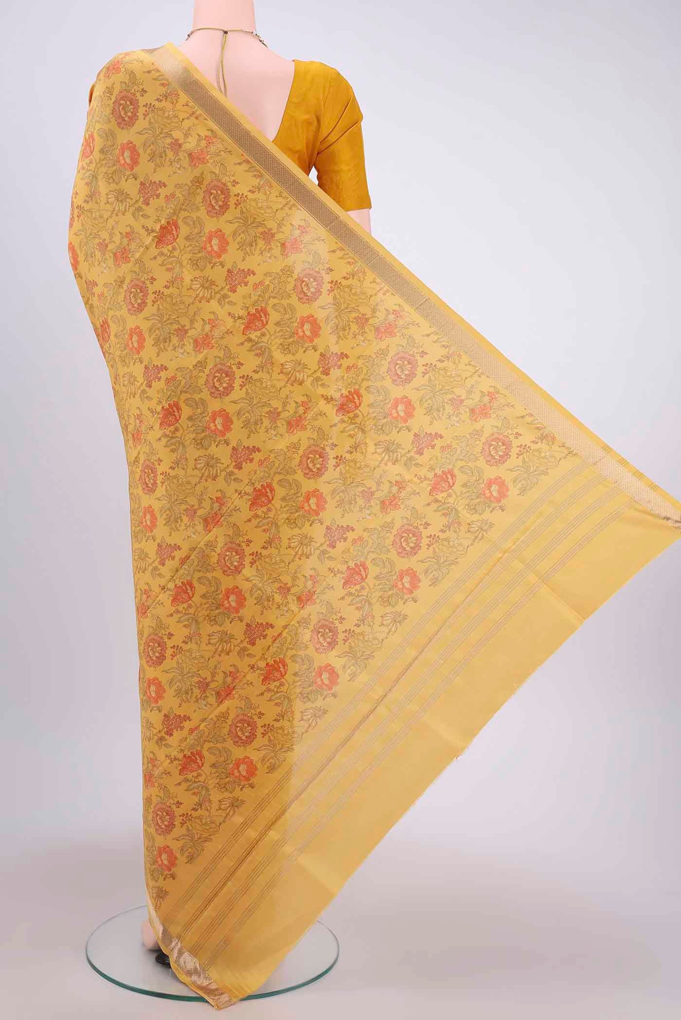 Flat view of Mustard Printed Silk Saree with Floral Print on the body and Zari Border