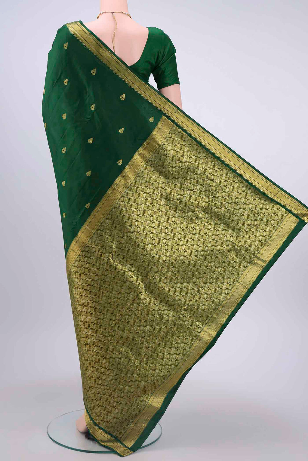 Flat view of Bottle Green Nangavalli Silk [ Salem ] Saree with Zari Butta on the body and Zari Border