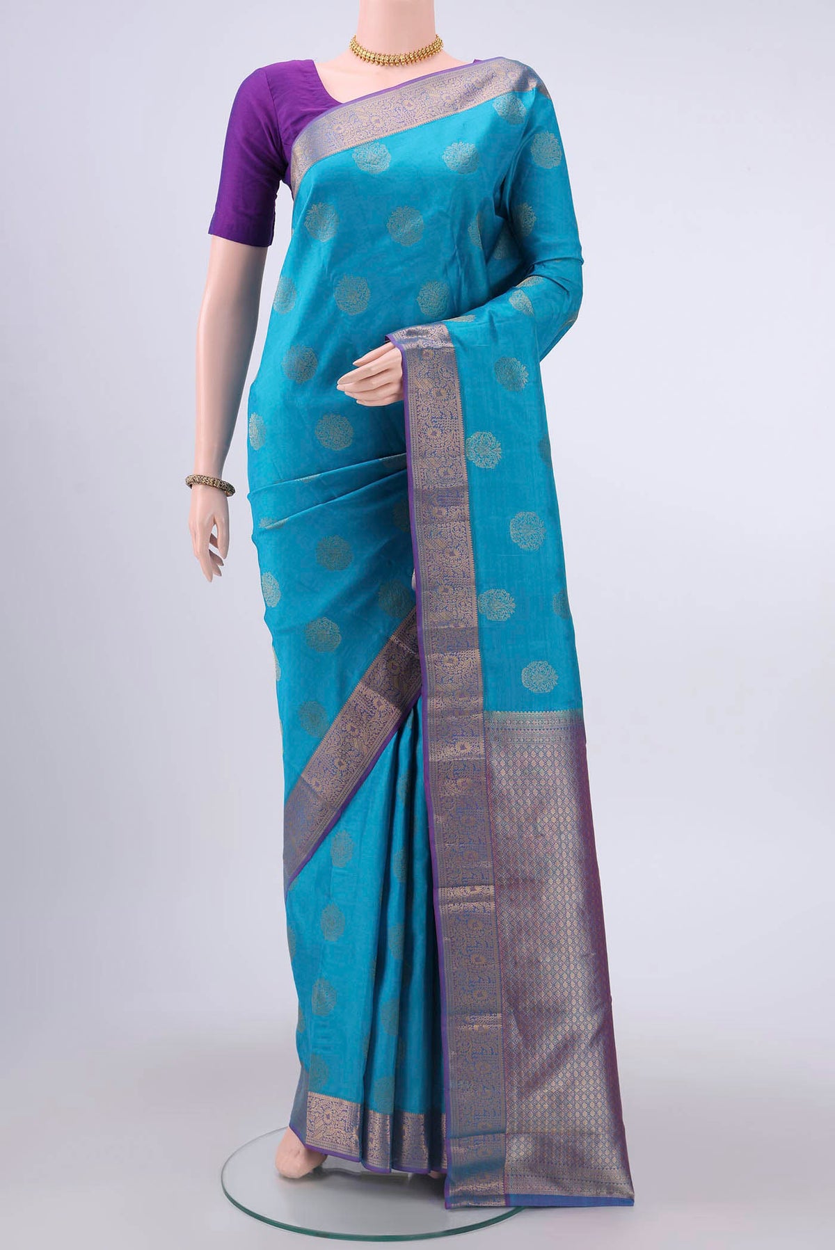Electric Blue Dual Tone Nangavalli Silk [ Salem ] Saree with Zari Butta on the body and Zari Border displayed on a mannequin