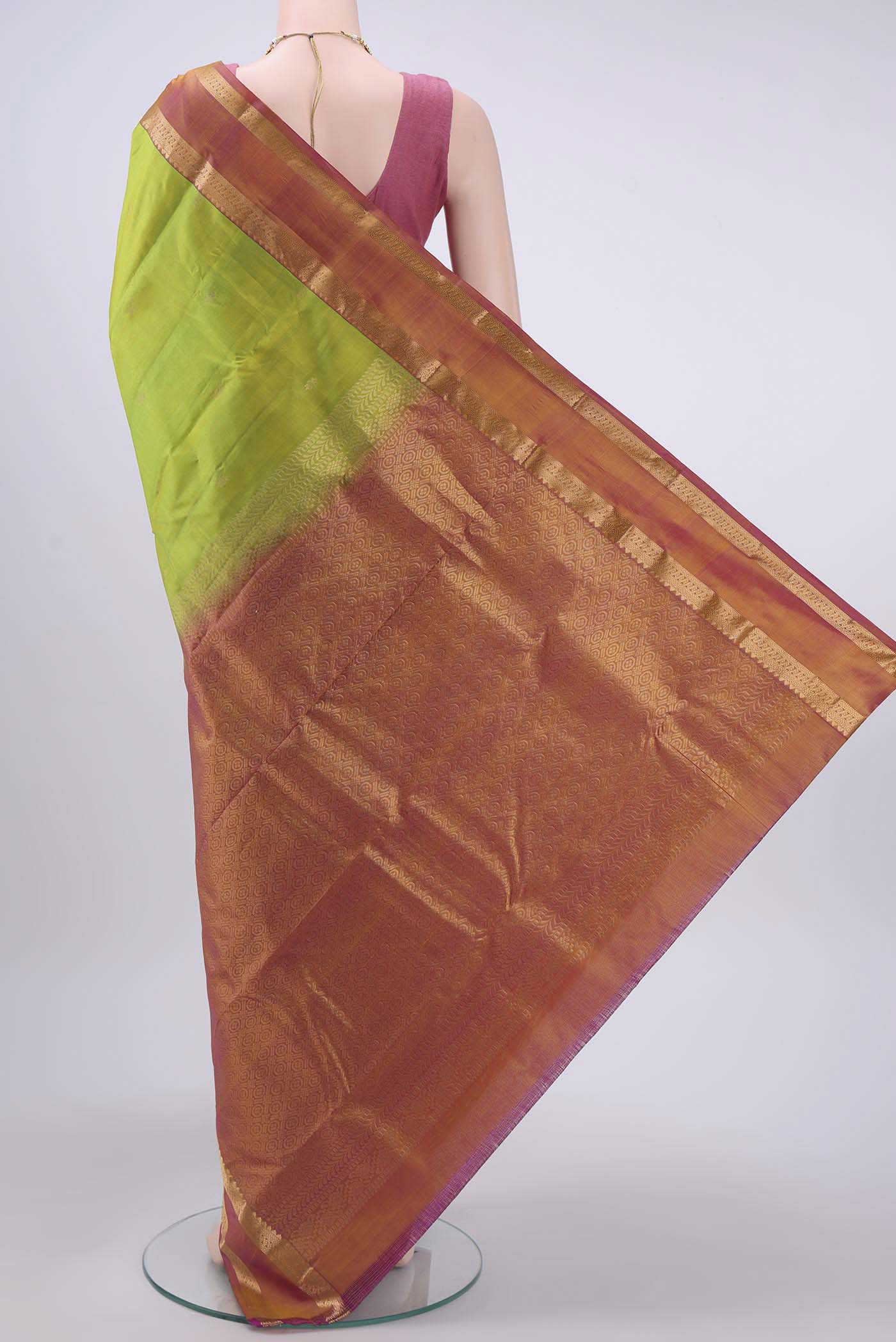 Flat view of Parrot Green Nangavalli Silk [ Salem ] Saree with Zari Butta on the body and Zari Border