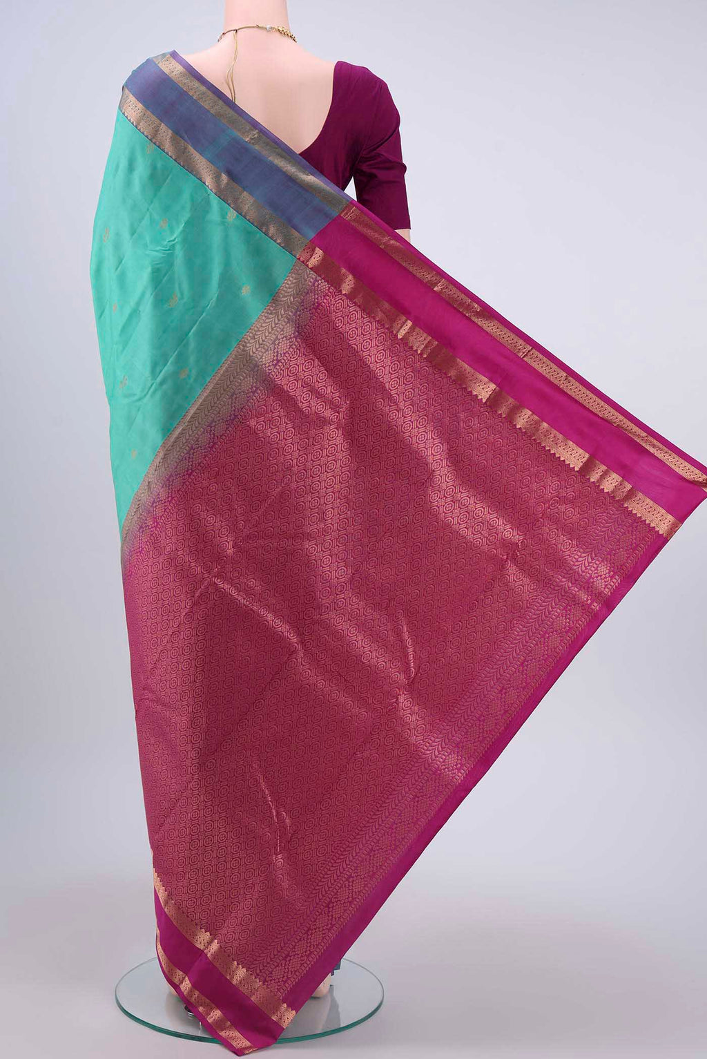Flat view of Turquoise Nangavalli Silk [ Salem ] Saree with Zari Butta on the body and Zari Border