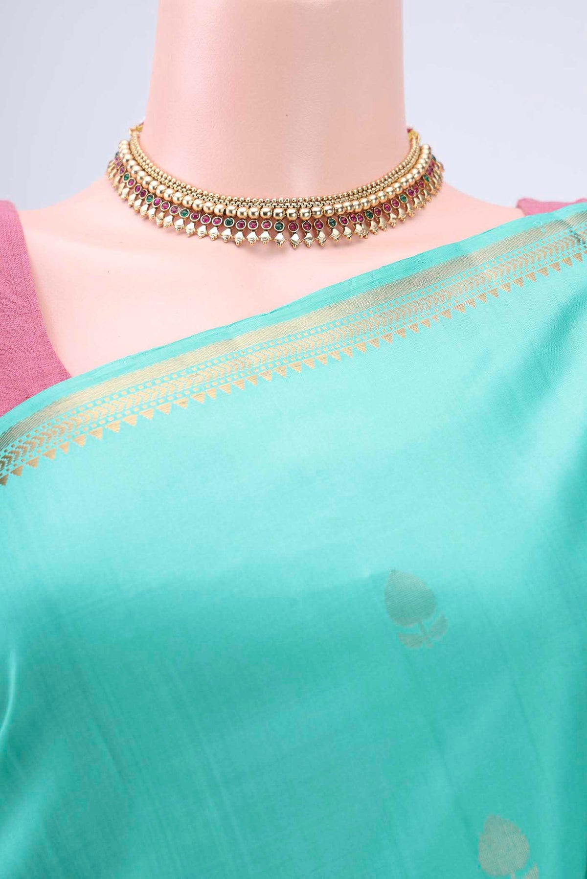 Border image of Mint Green Soft Silk Saree with Plain Body and Zari Border