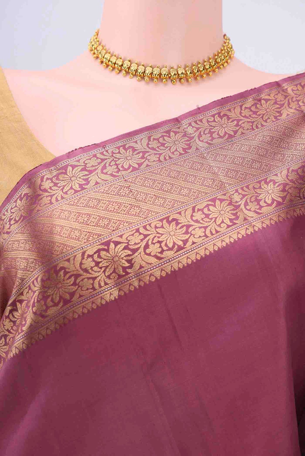 Border image of Coral Soft Silk Saree with Zari Butta on the body and Zari Border