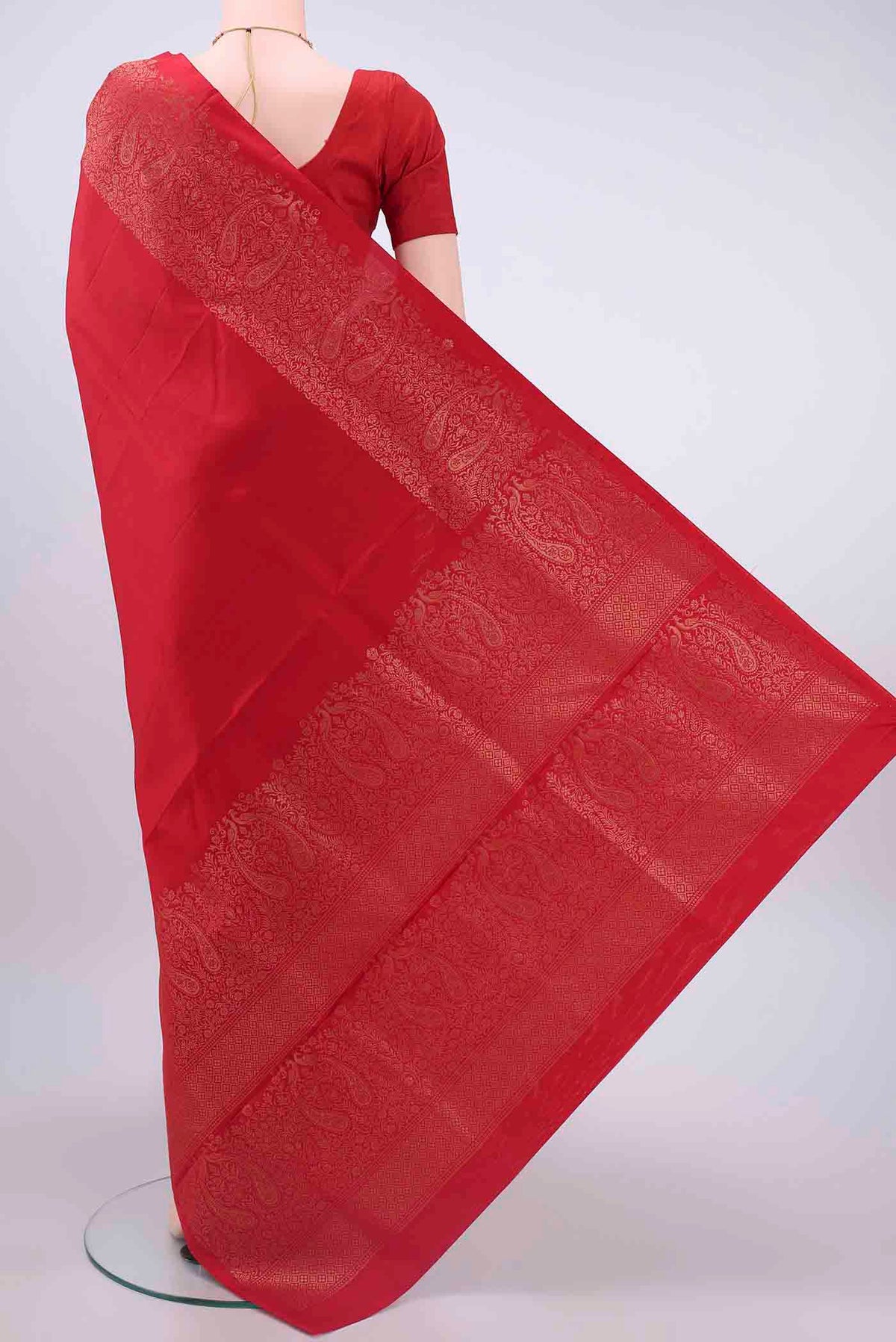 Flat view of Red Soft Silk Saree with Plain Body and Zari Border