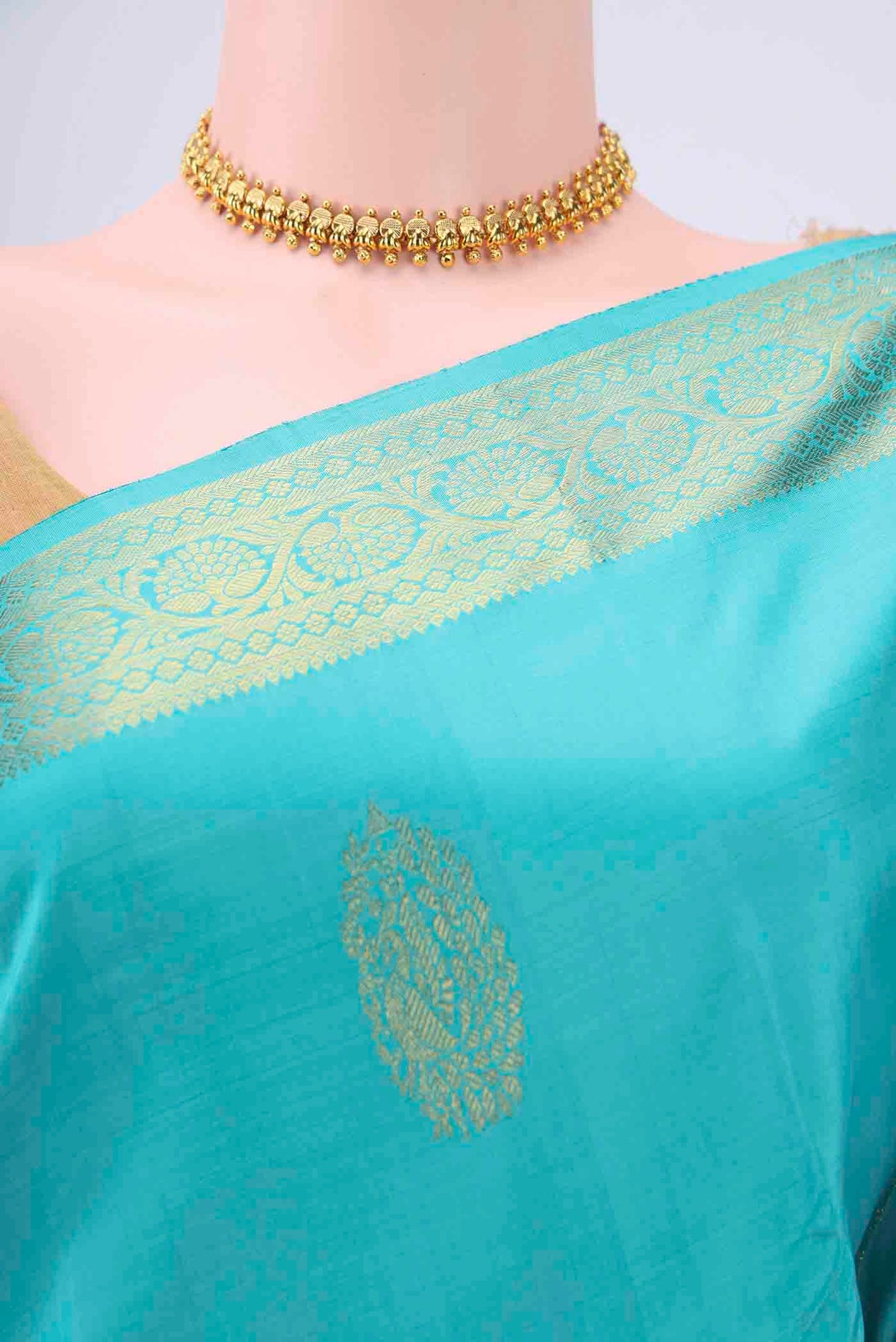Border image of Blue Kanchipuram Silk Saree with Zari Butta on the body and Zari Border