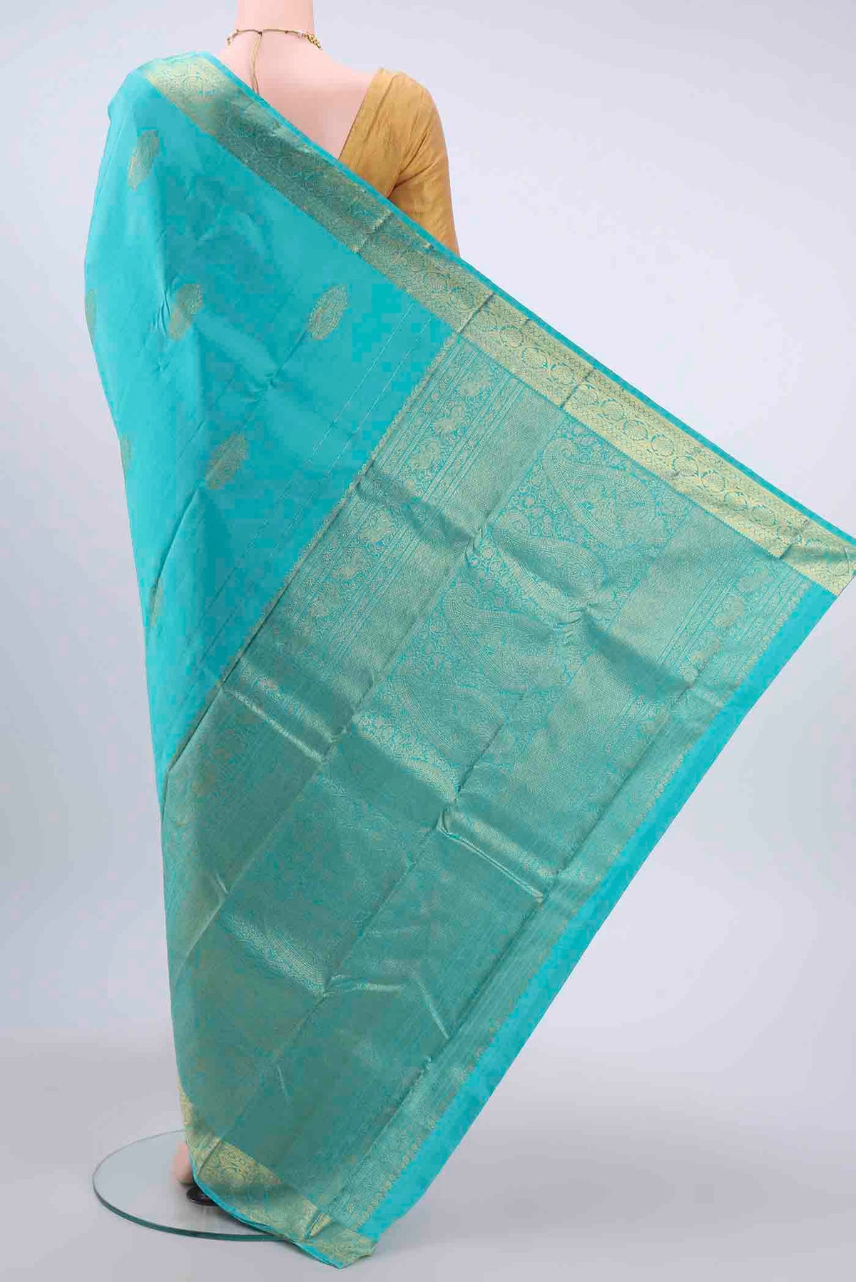Flat view of Blue Kanchipuram Silk Saree with Zari Butta on the body and Zari Border