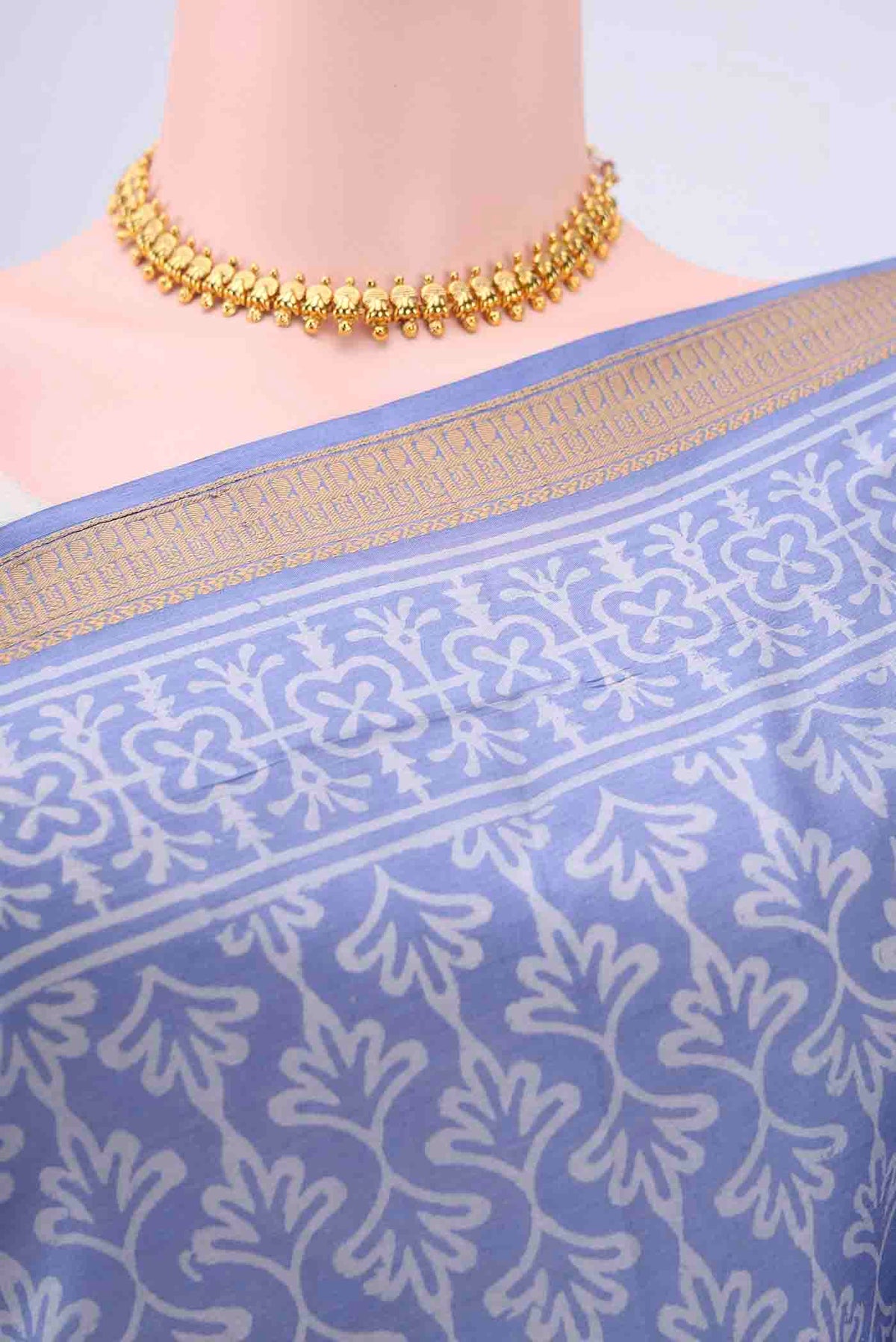 Border image of Light Blue Printed Silk Saree with Printed design on the body and Zari Border