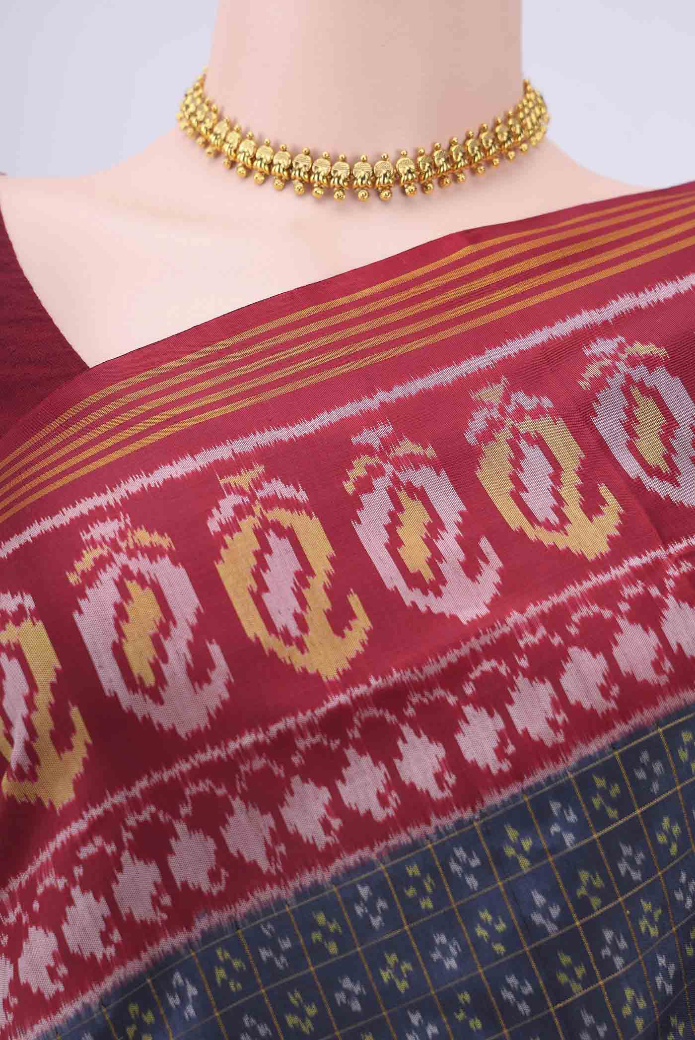 Border image of Blue Grey Dual Tone Rajkot Patola Silk Saree with Ikat design on the body and Zari Border