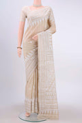 Beige Kantha Silk Saree with Kantha Work on the body and Thread Border displayed on a mannequin