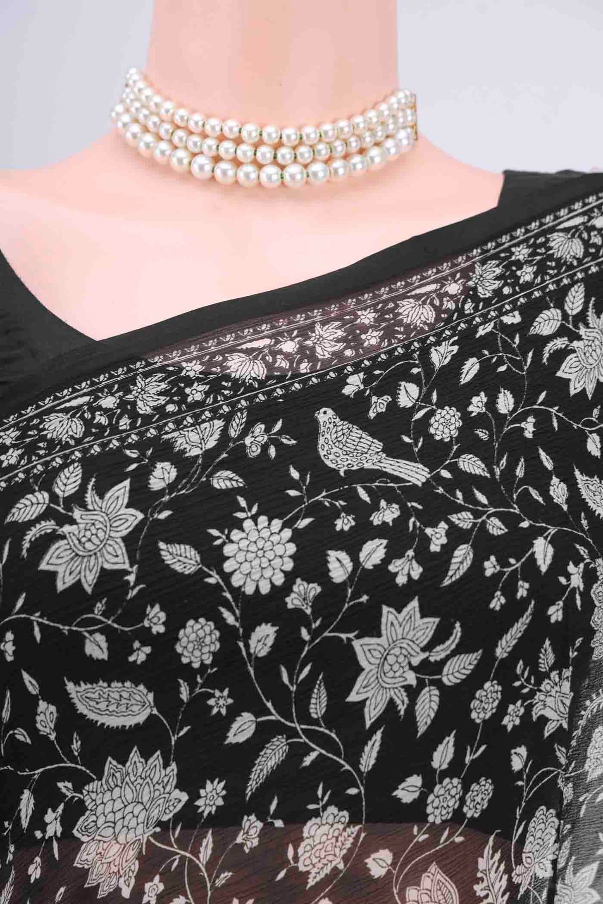 Border image of Black Mysore Crepe Saree with Floral Print on the body and Zari Border