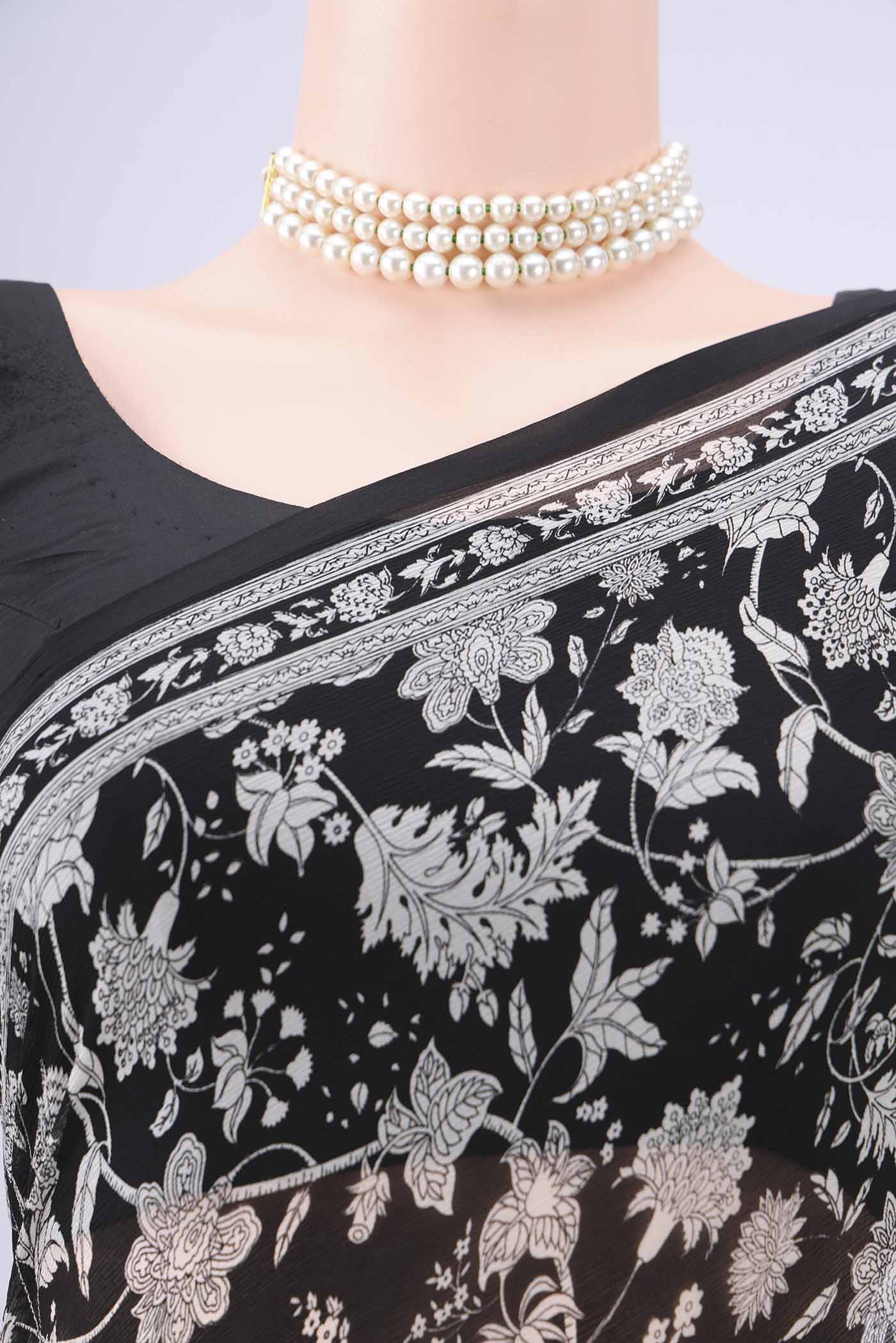 Border image of Black Mysore Chiffon Saree with Floral Print on the body and Zari Border. 