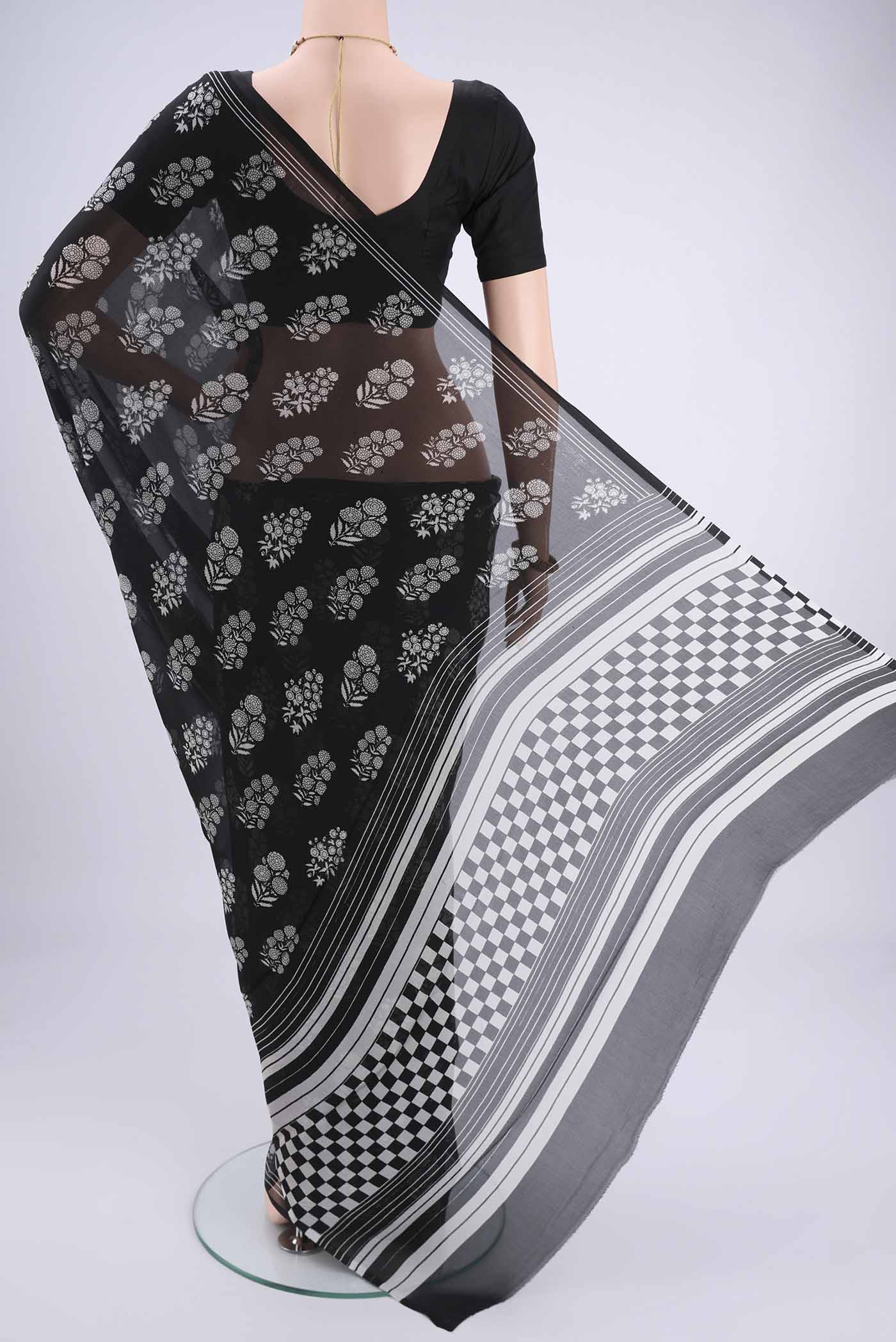 Flat view of Black Mysore Chiffon Saree with Floral Print on the body and Plain Border. 