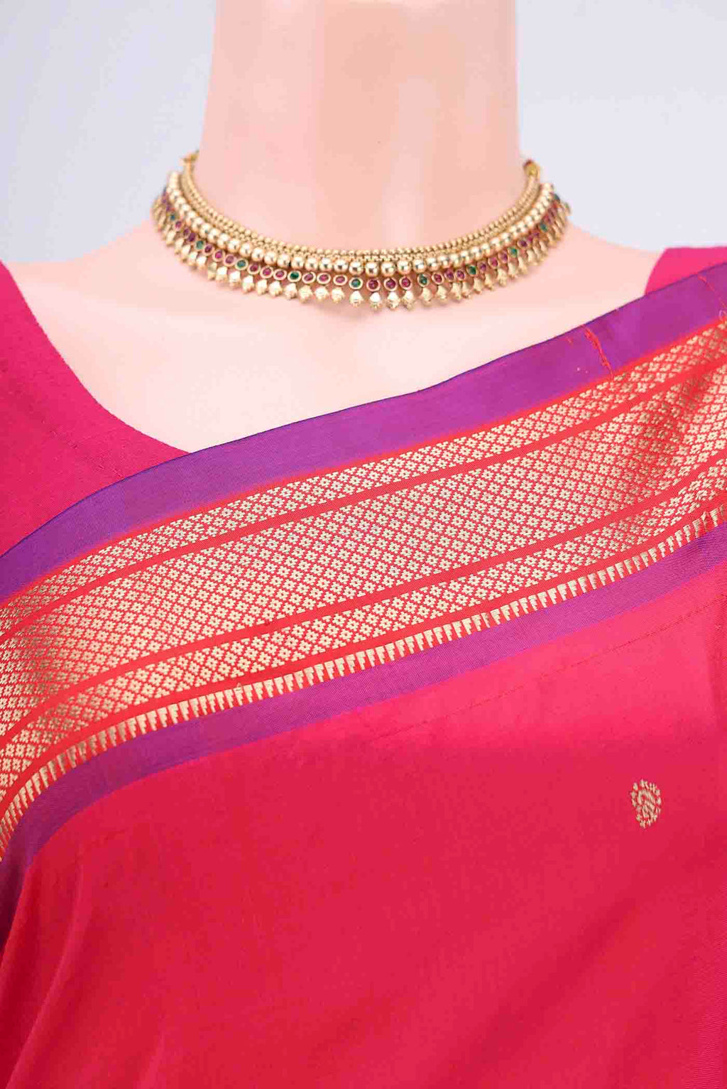Border image of Dark Pink Paithani Silk Saree with Zari Butta on the body and Zari Border. 