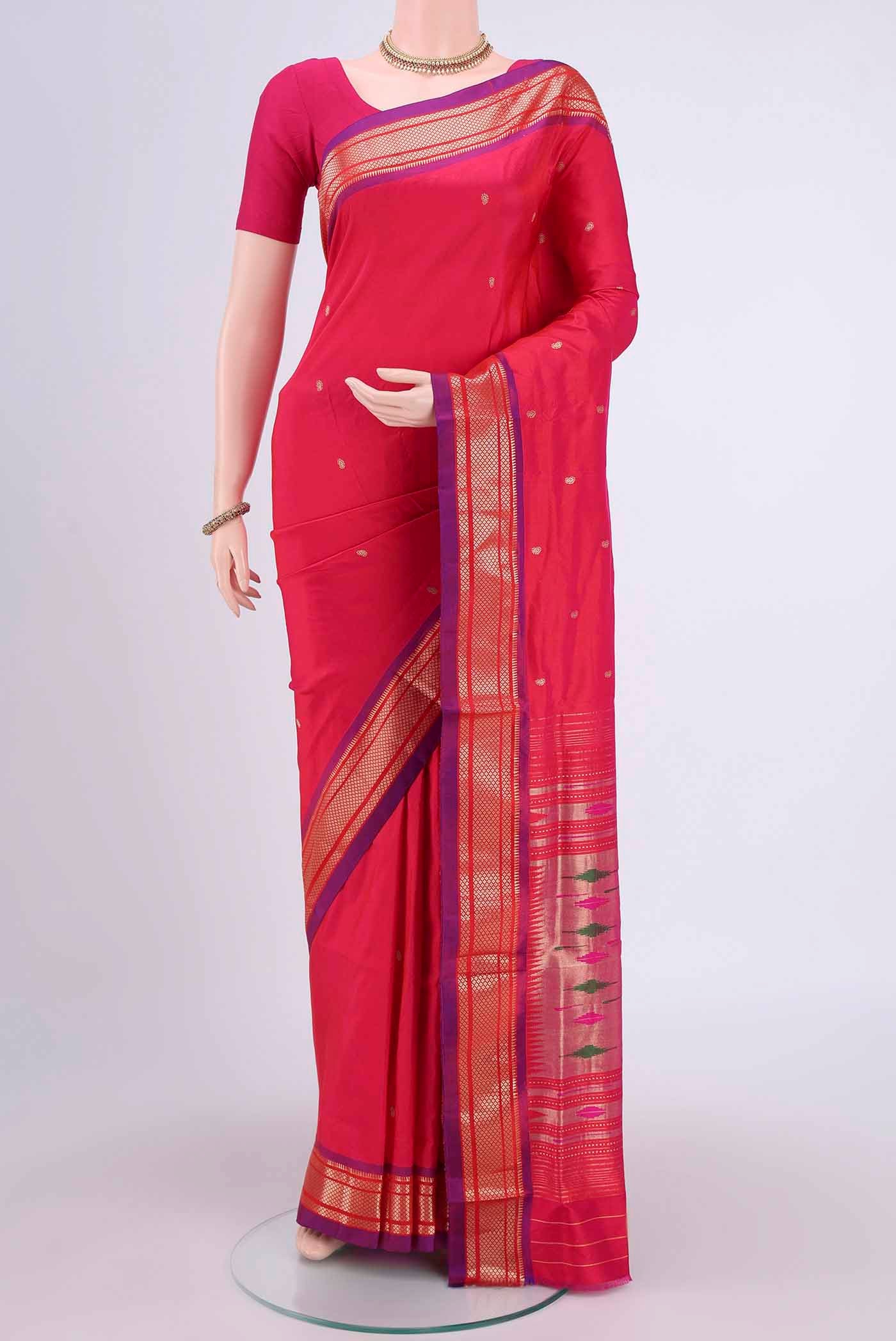 Dark Pink Paithani Silk Saree with Zari Butta on the body and Zari Border.  displayed on a mannequin