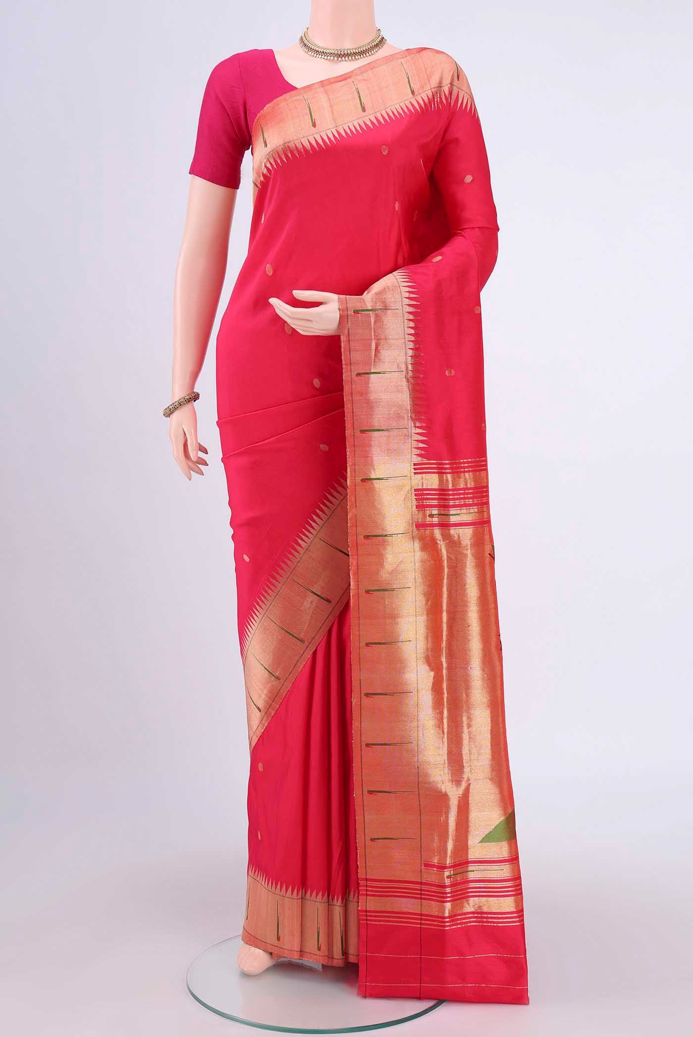 Dark Pink Paithani Silk Saree with Zari Butta on the body and Zari Border.  displayed on a mannequin