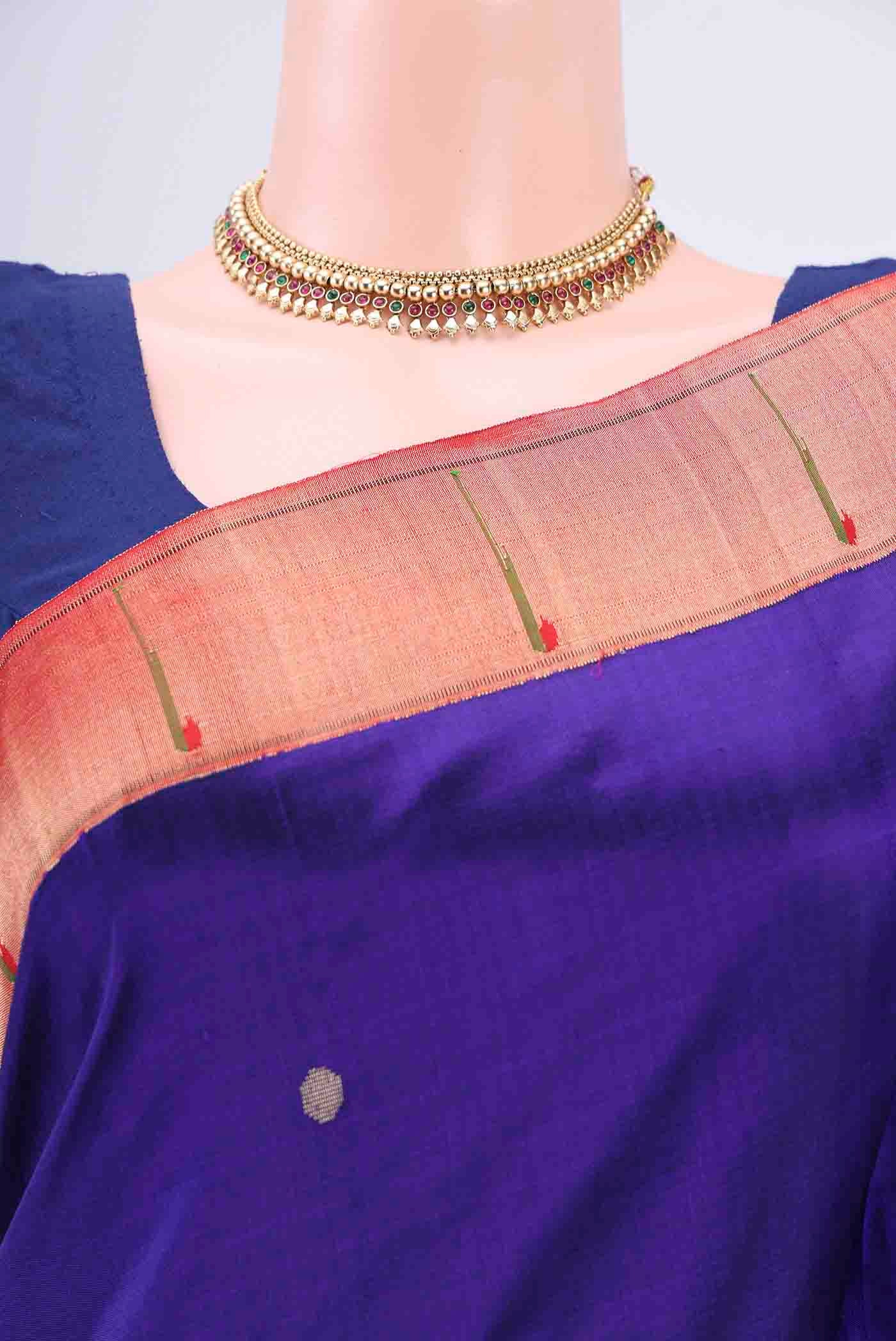 Border image of Purple Paithani Silk Saree with Zari Butta on the body and Zari Border. 