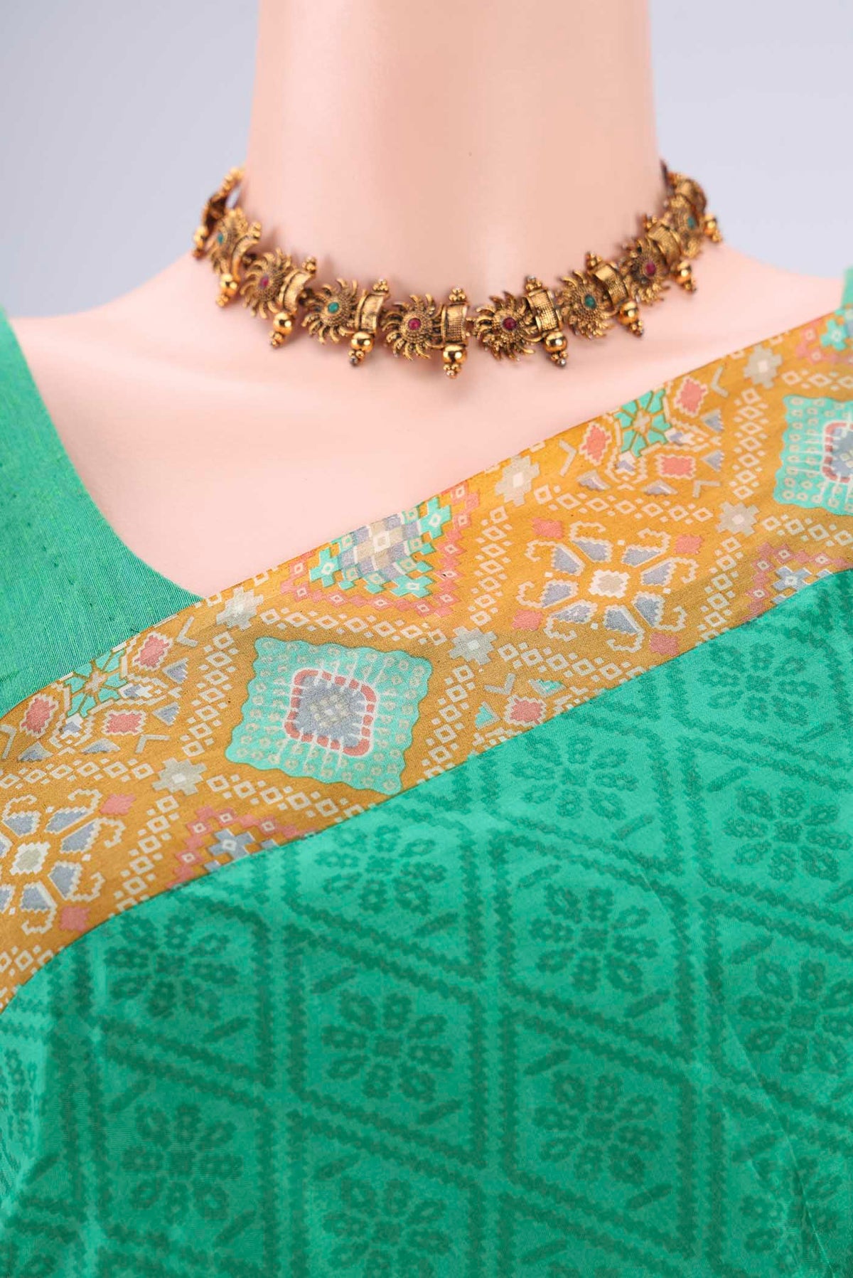 Border image of Green Printed Silk Saree with Floral Print on the body and Printed Border. 