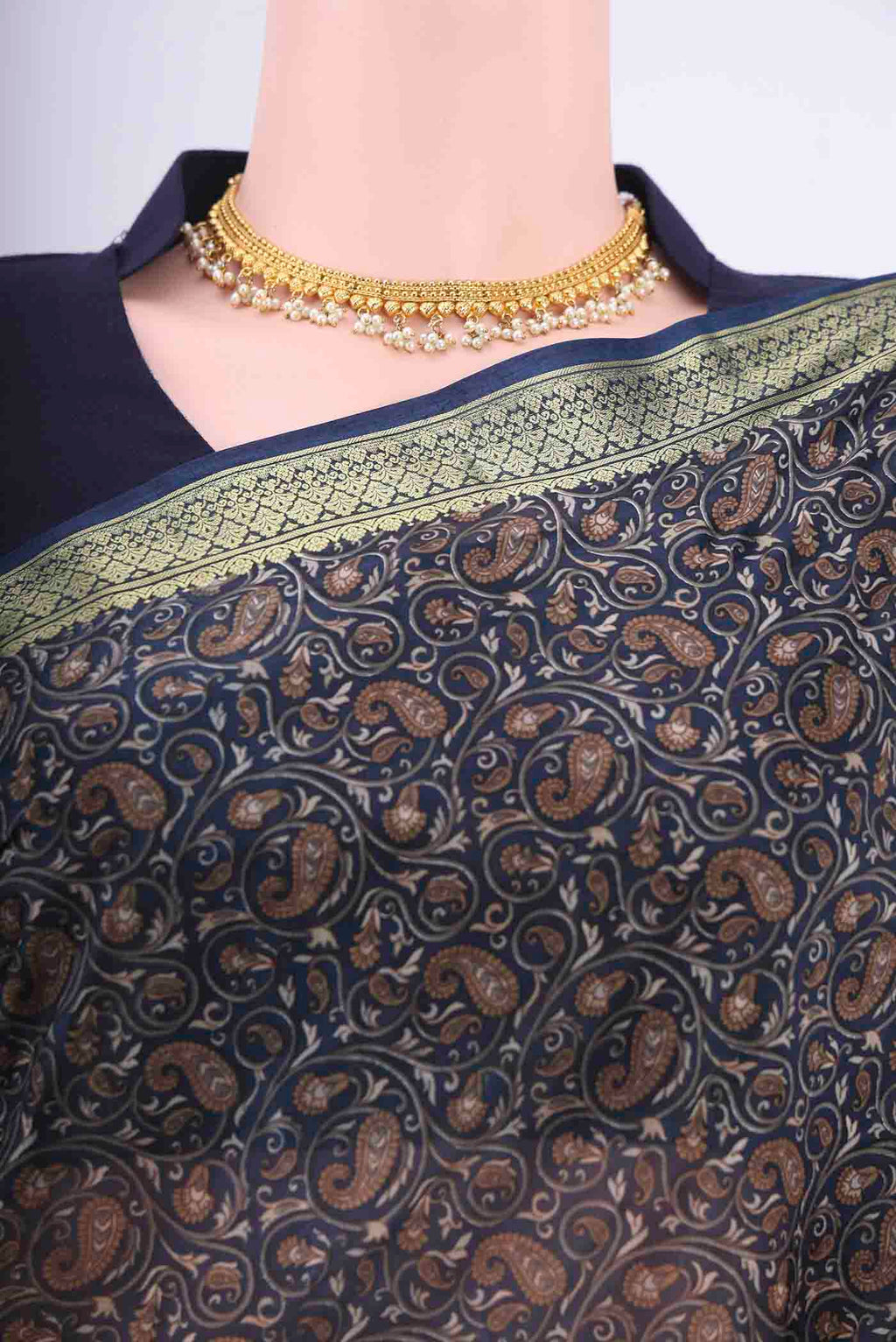Border image of Navy Blue Printed Silk Saree with Floral Print on the body and Zari Border