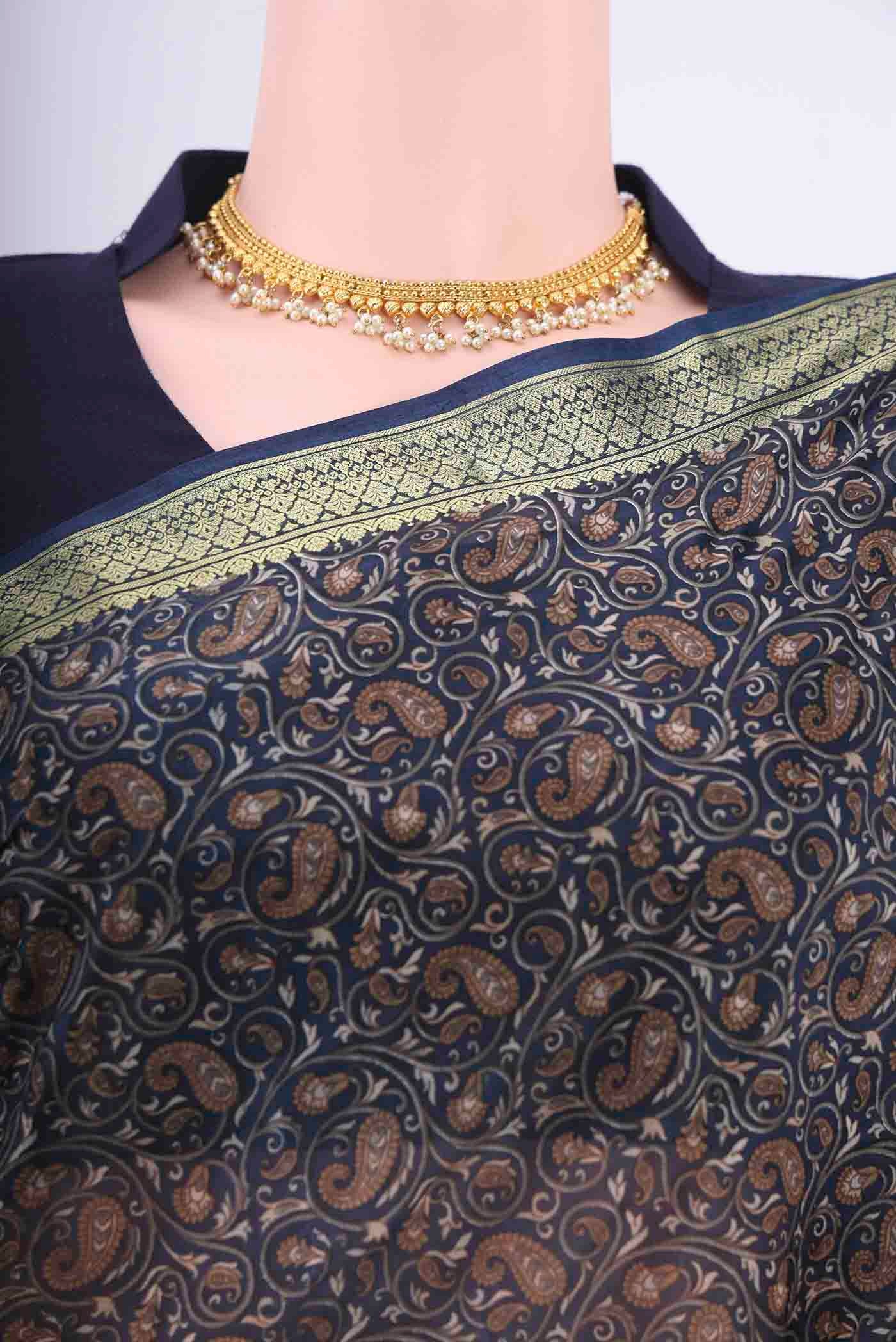 Border image of Navy Blue Printed Silk Saree with Floral Print on the body and Zari Border