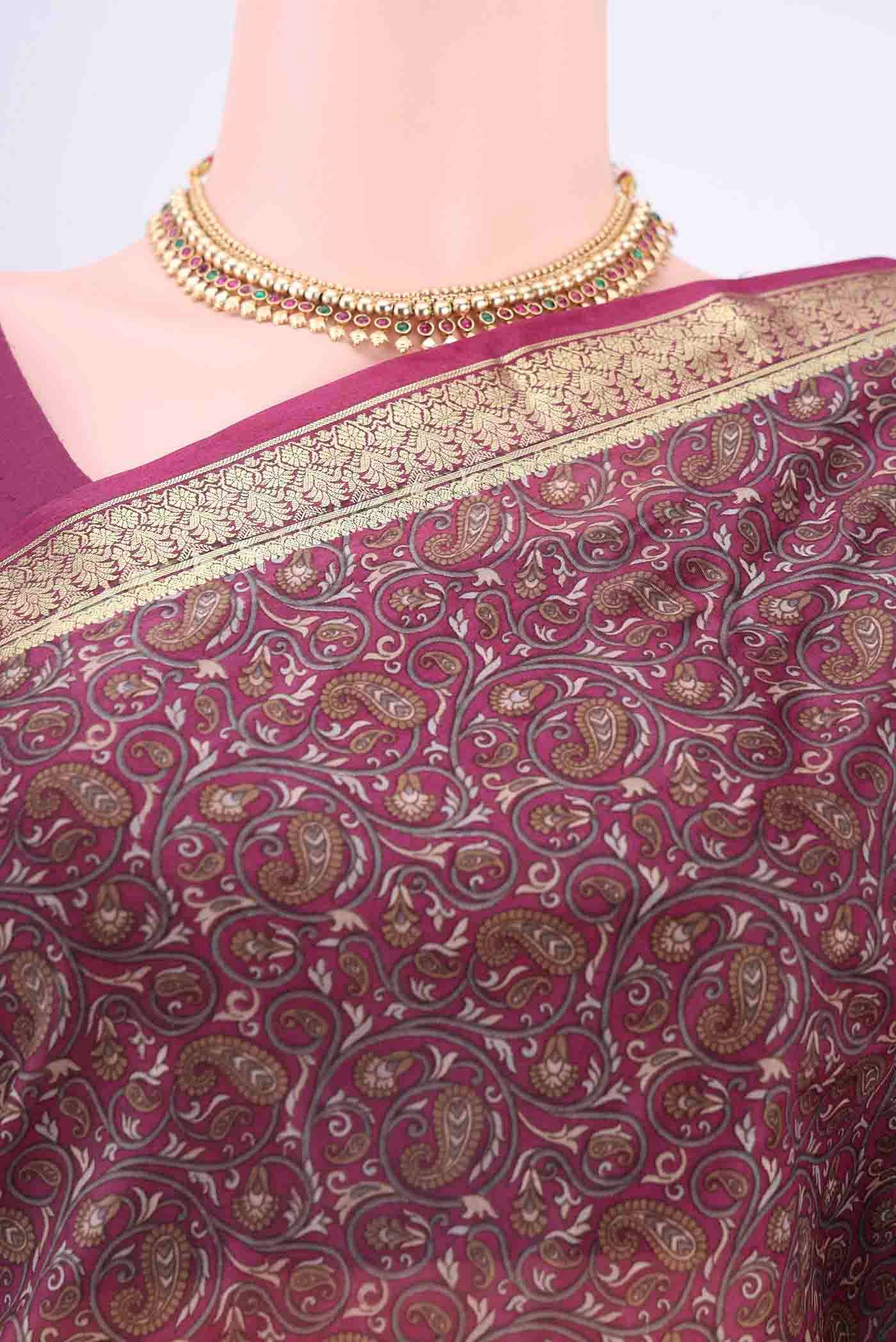 Border image of Magenta Printed Silk Saree with Floral Print on the body and Zari Border