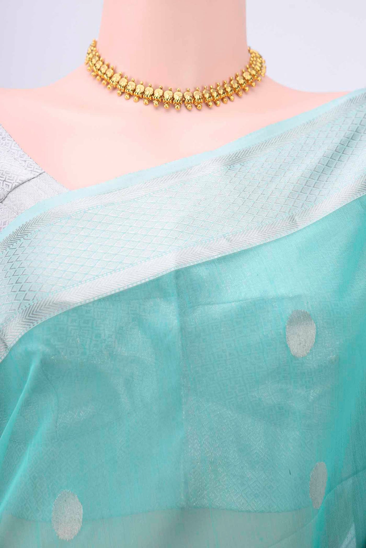 Border image of Turquoise Maheshwari Silk Cotton Saree with Zari Butta on the body and Zari Border