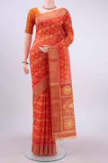 Orange Kora Cotton Saree with Ikat design on the body and Zari Border displayed on a mannequin