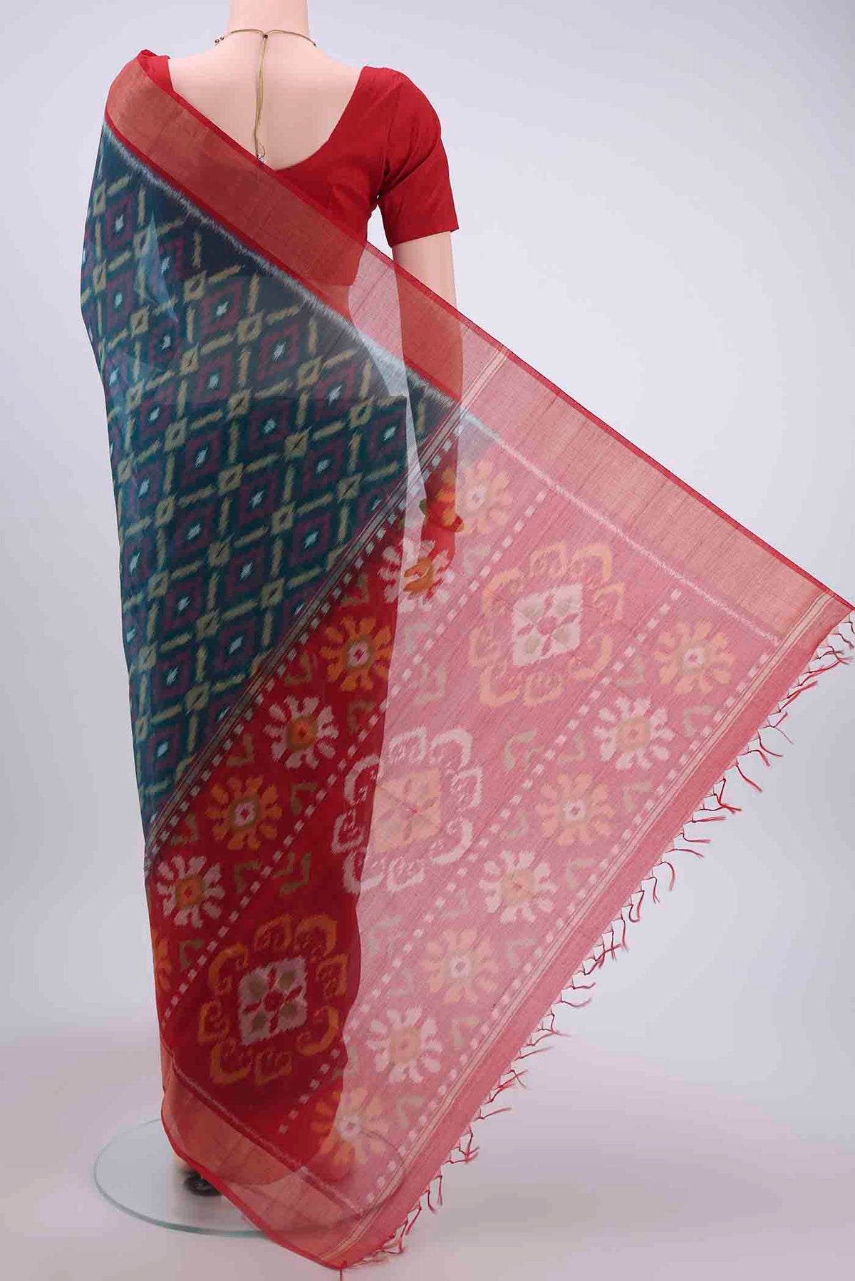 Flat view of Navy Blue Silk Cotton Saree with Pure Ikat on the body and Zari Border