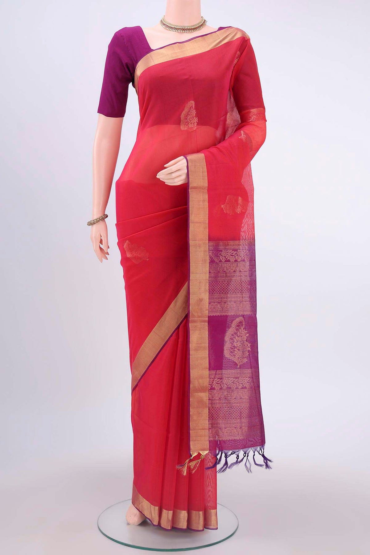Red Kora Cotton Saree with Zari Butta on the body and Zari Border displayed on a mannequin