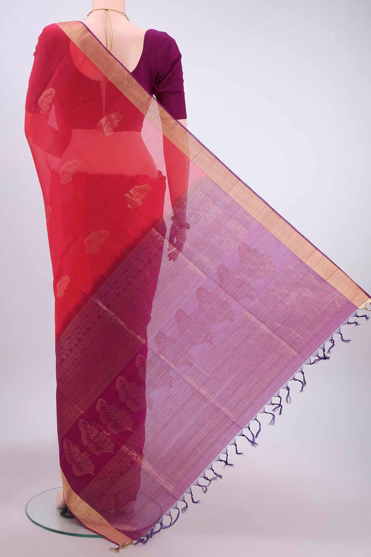 Flat view of Red Kora Cotton Saree with Zari Butta on the body and Zari Border