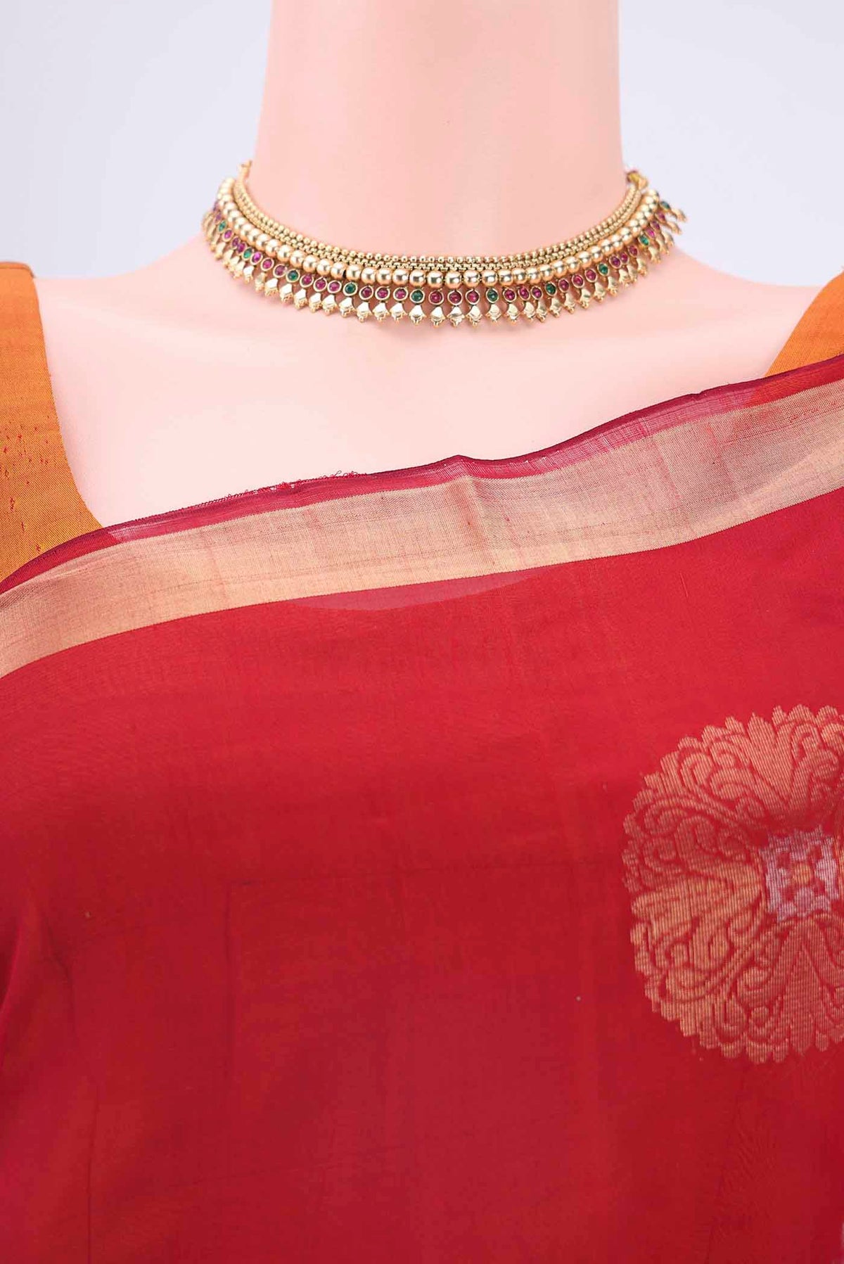 Border image of Red Silk Cotton Saree with Zari Butta on the body and Zari Border