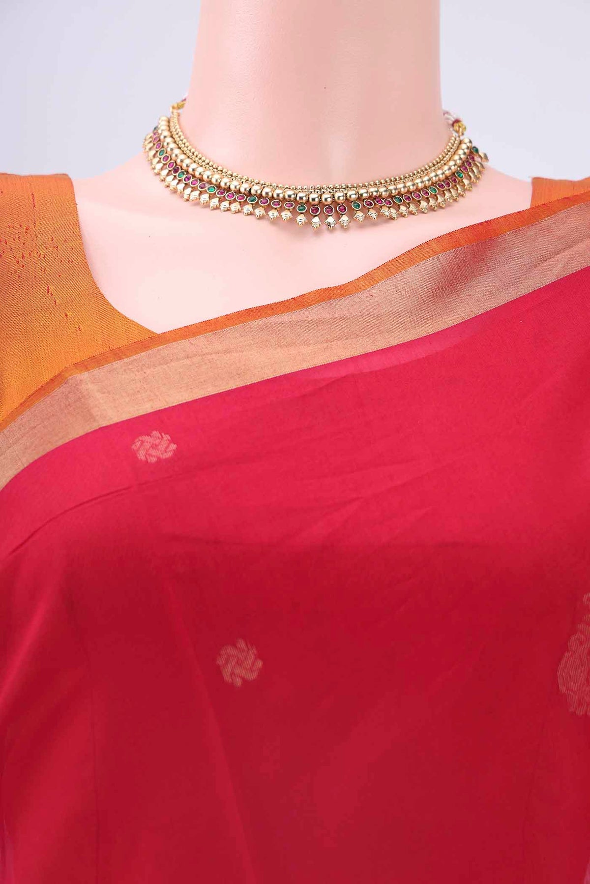 Border image of Red Kora Cotton Saree with Zari Butta on the body and Zari Border
