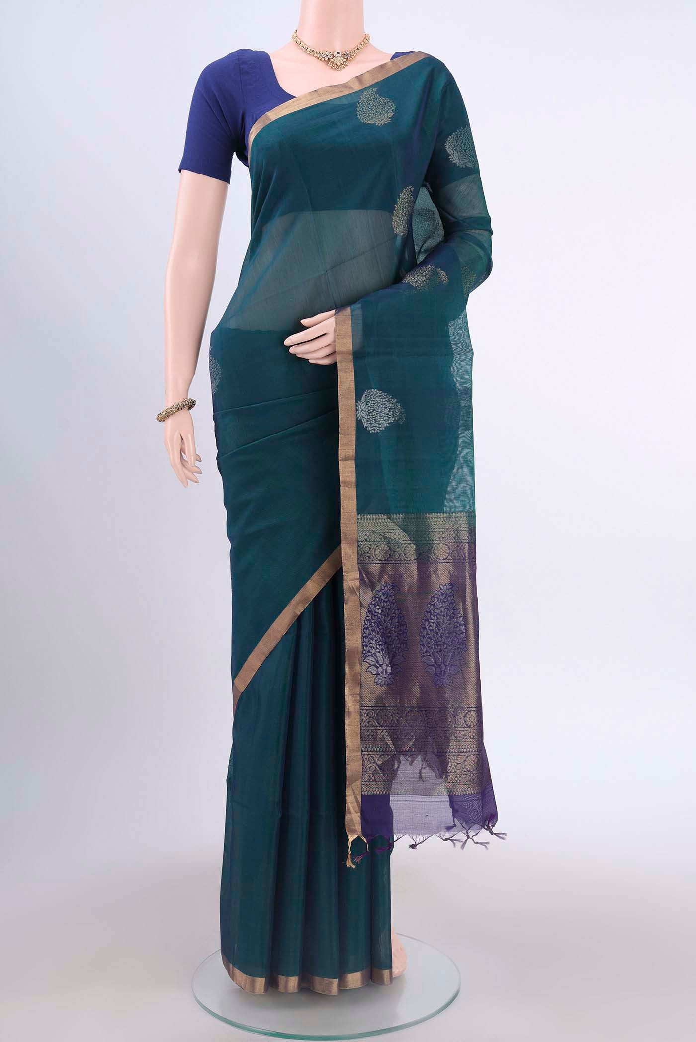 Blue Kora Cotton Saree with Zari Butta on the body and Zari Border displayed on a mannequin