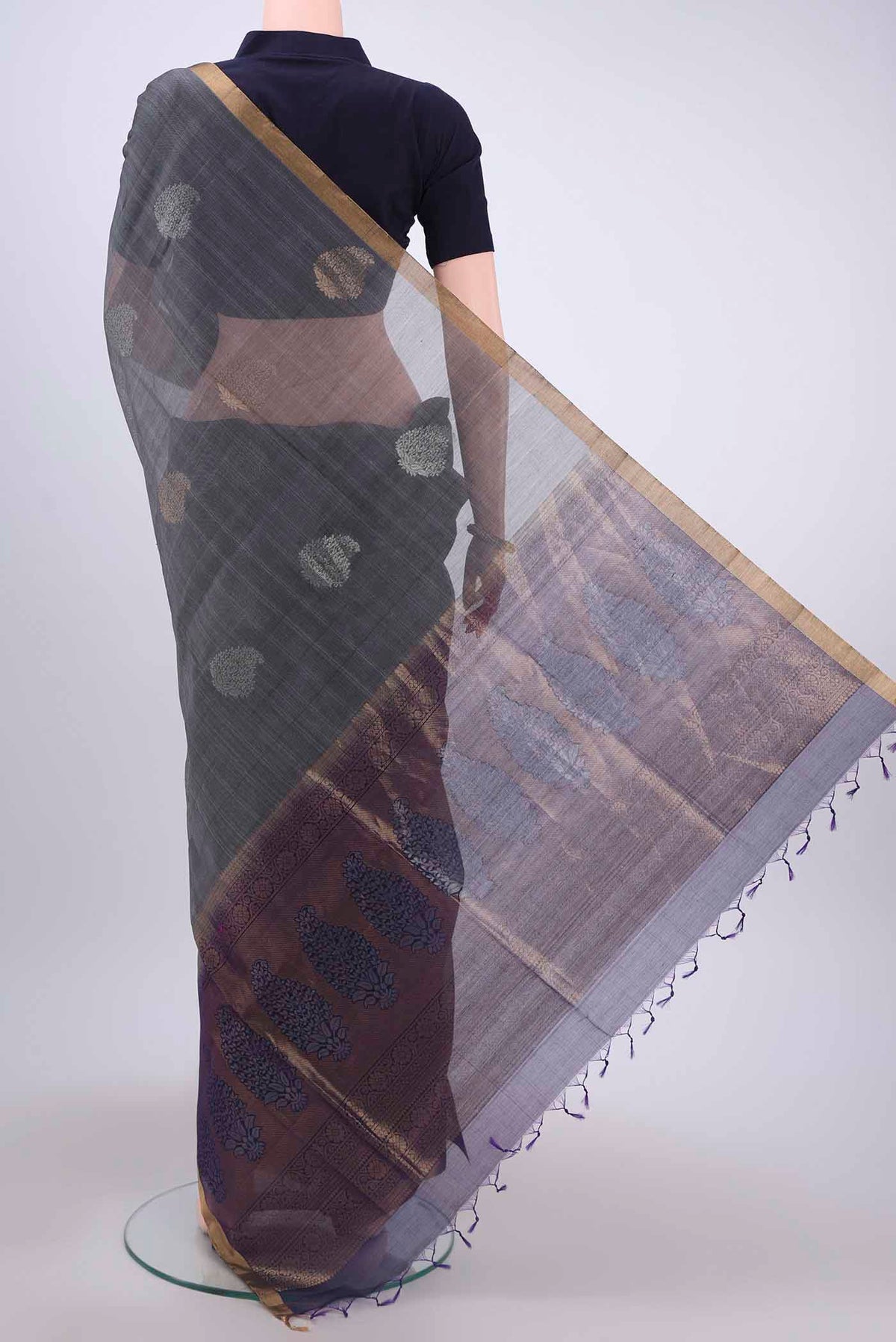 Flat view of Grey Kora Cotton Saree with Zari Butta on the body and Zari Border