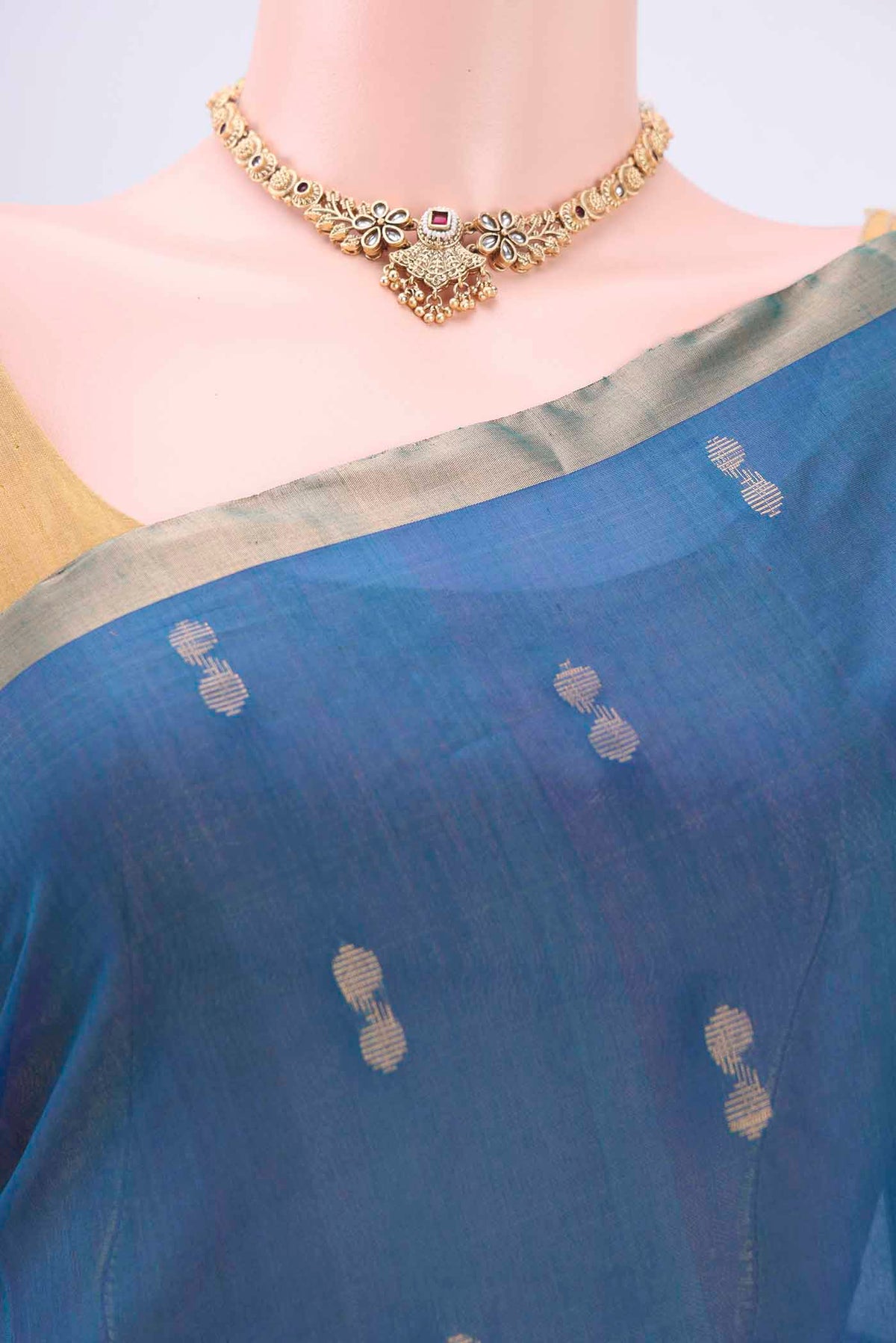 Border image of Peacock Blue Kora Cotton Saree with Zari Butta on the body and Zari Border