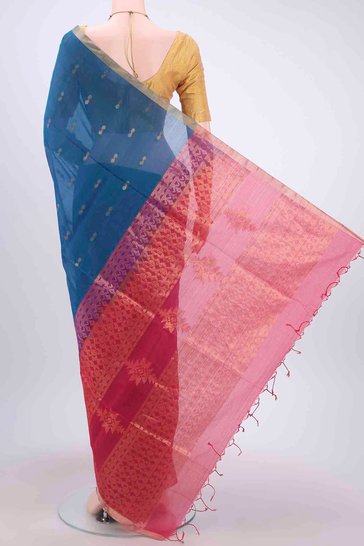 Flat view of Peacock Blue Kora Cotton Saree with Zari Butta on the body and Zari Border