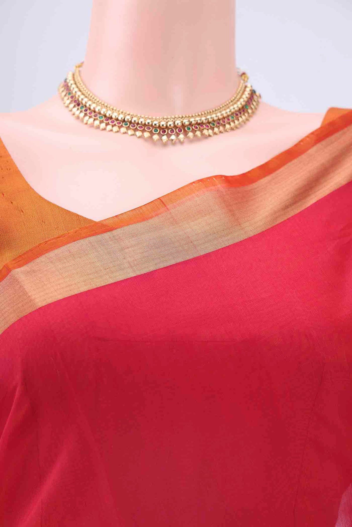 Border image of Rani Pink Kora Cotton Saree with Zari Butta on the body and Zari Border