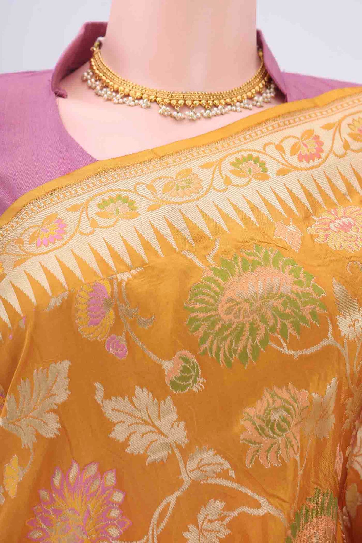 Border image of Mustard Banarasi Silk Saree with Zari Brocade on the body and Zari Border