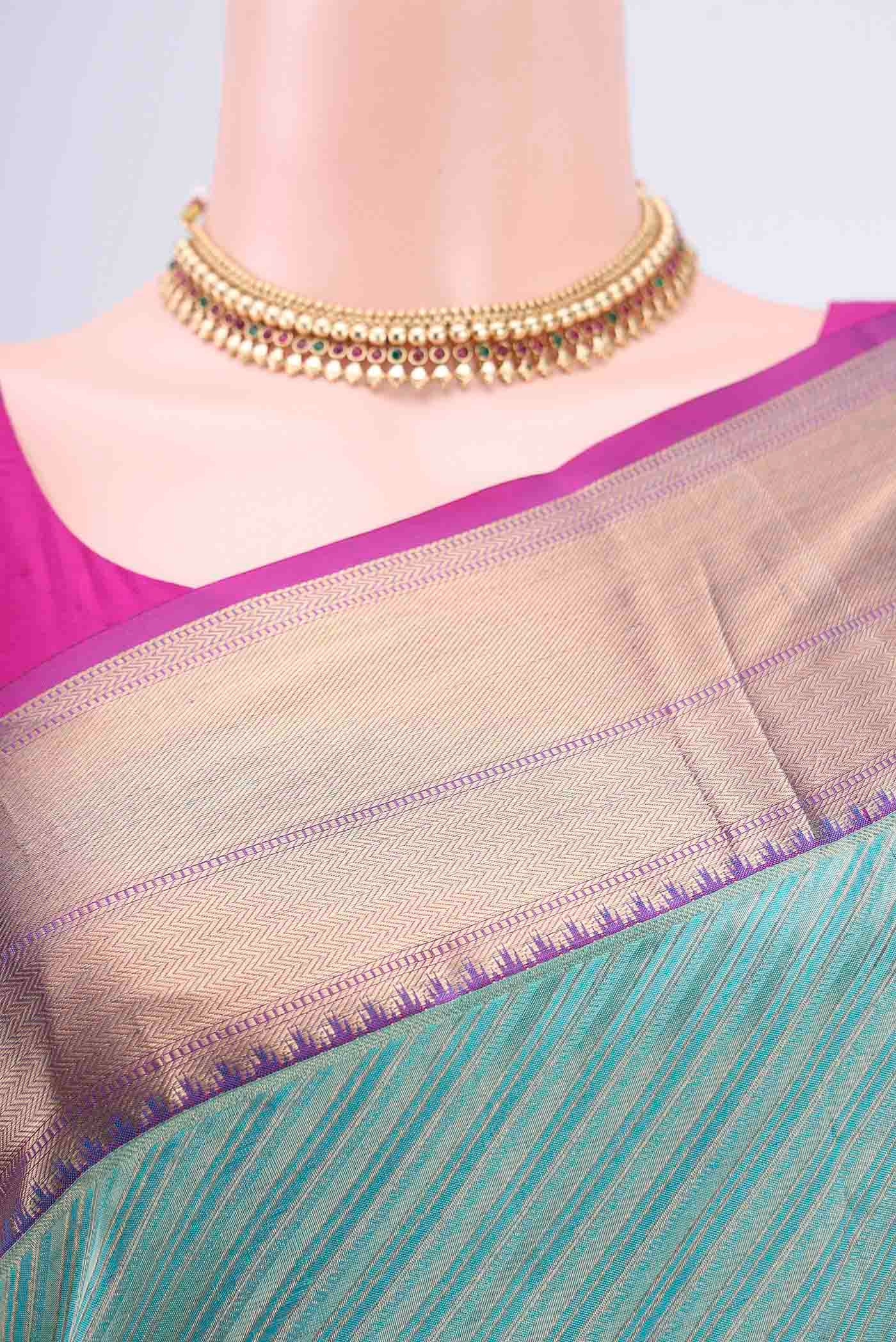 Border image of Turquoise Soft Silk Saree with Zari Brocade on the body and Zari Border