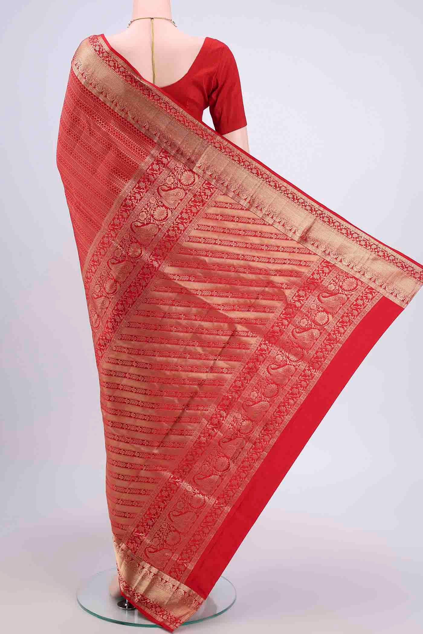 Flat view of Red Soft Silk Saree with Zari Brocade on the body and Zari Border